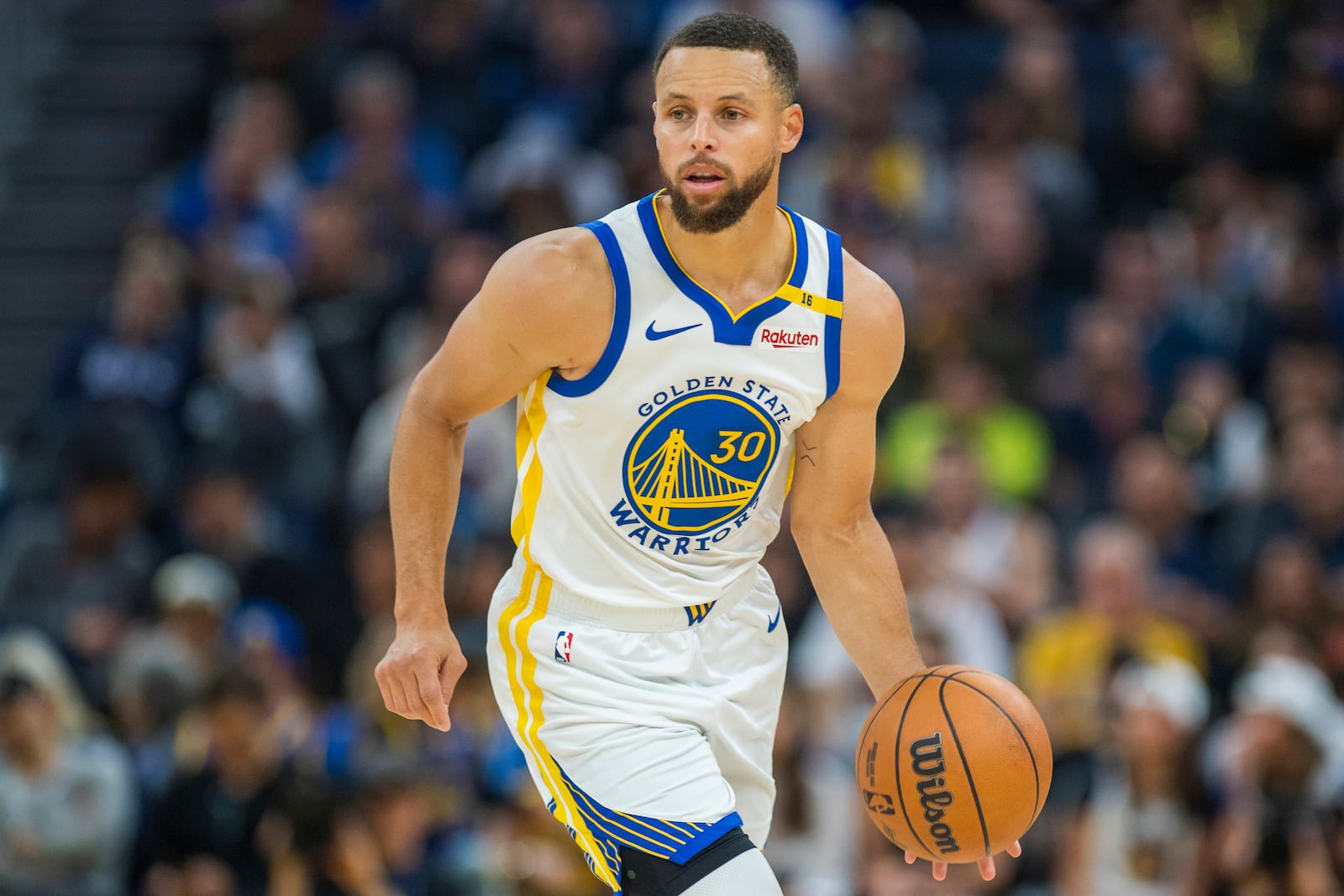 Golden State Warriors guard Stephen Curry (30) dribbles during the first half of an NBA basketball game against the Los Angeles Clippers in San Francisco, Sunday, Oct. 27, 2024. (AP Photo/Nic Coury)