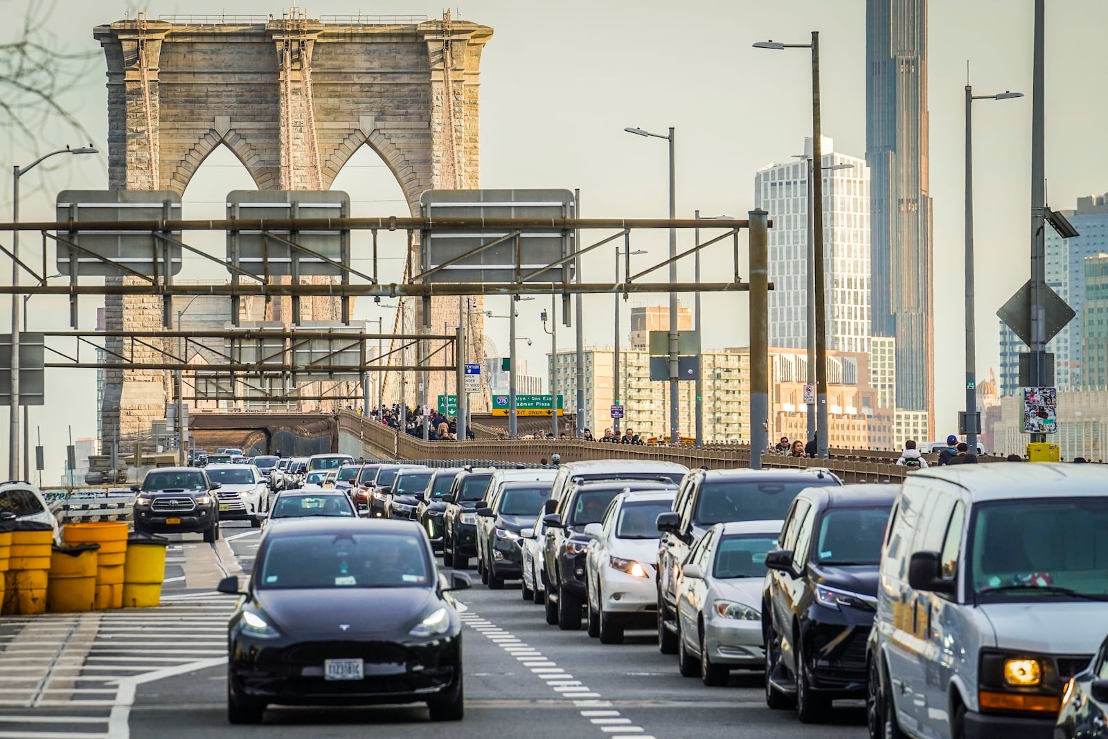 FILE - Traffic enters lower Manhattan after crossing the Brooklyn Bridge, Feb. 8, 2024, in New York. (AP Photo/Bebeto Matthews, File)