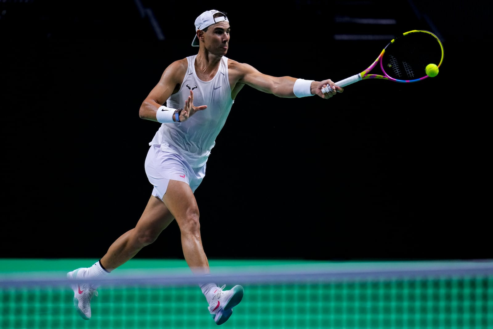 Spain's tennis player Rafael Nadal takes part in a training session at the Martin Carpena Sports Hall, in Malaga, southern Spain, on Friday, Nov. 15, 2024. (AP Photo/Manu Fernandez)