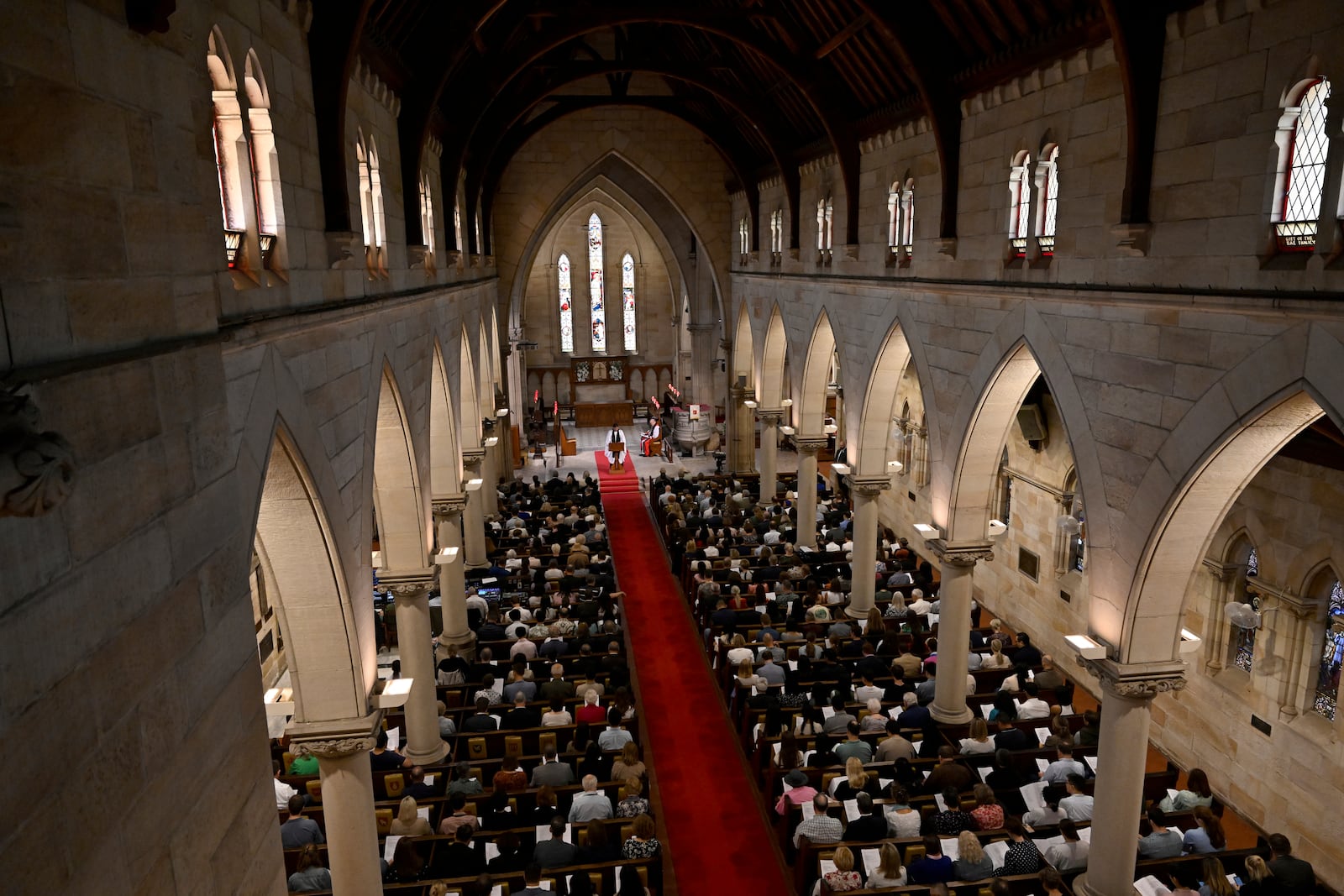 Attendees, including King Charles III and Queen Camilla, sit during a visit to St Thomas' Anglican Church in Sydney, Sunday, Oct. 20, 2024. (Dean Lewins/Pool Photo via AP)