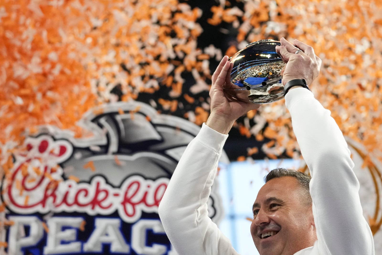 Texas head coach Steve Sarkisian celebrates victory after a quarterfinals College Football Playoff game against Arizona State, Wednesday, Jan. 1, 2025, in Atlanta. Texas won 39-31 in two overtime periods. (AP Photo/Brynn Anderson)