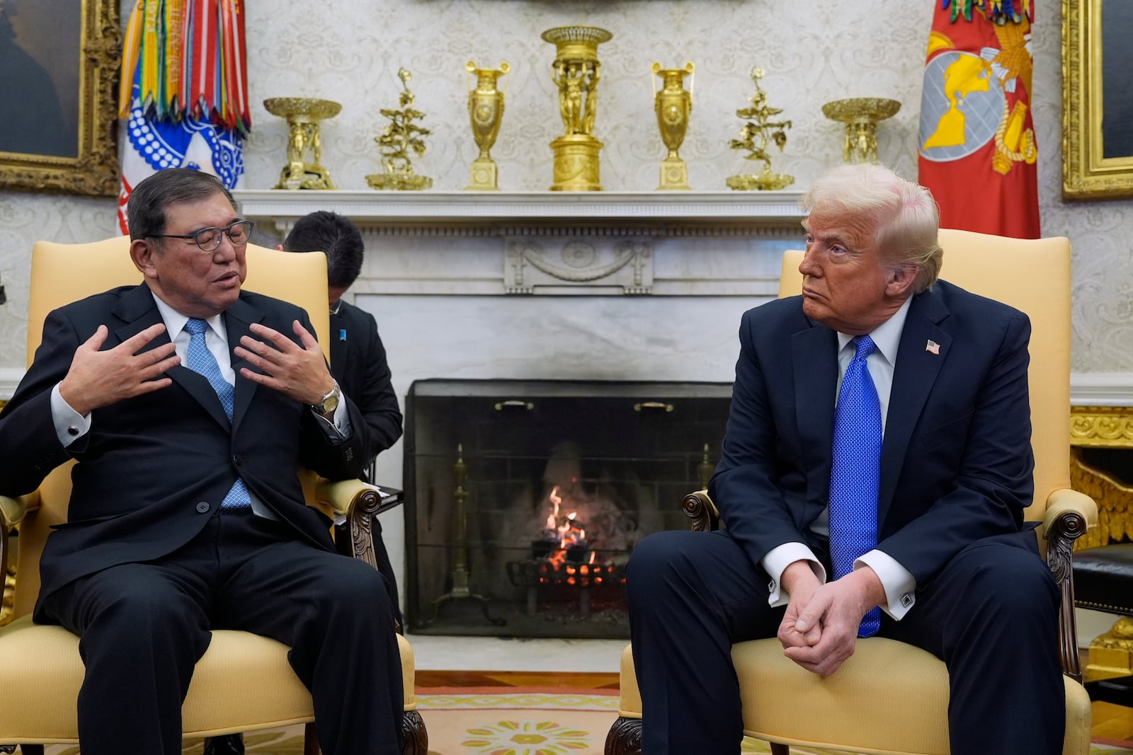 President Donald Trump speaks with Japanese Prime Minister Shigeru Ishiba in the Oval Office of the White House, Friday, Feb. 7, 2025, in Washington. (AP Photo/Alex Brandon)