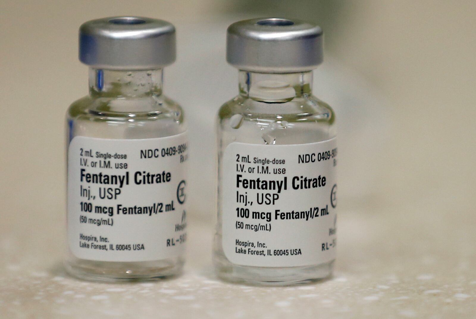 FILE - Small vials of fentanyl are shown in the inpatient pharmacy at the University of Utah Hospital in Salt Lake City, June 1, 2018. (AP Photo/Rick Bowmer, File)