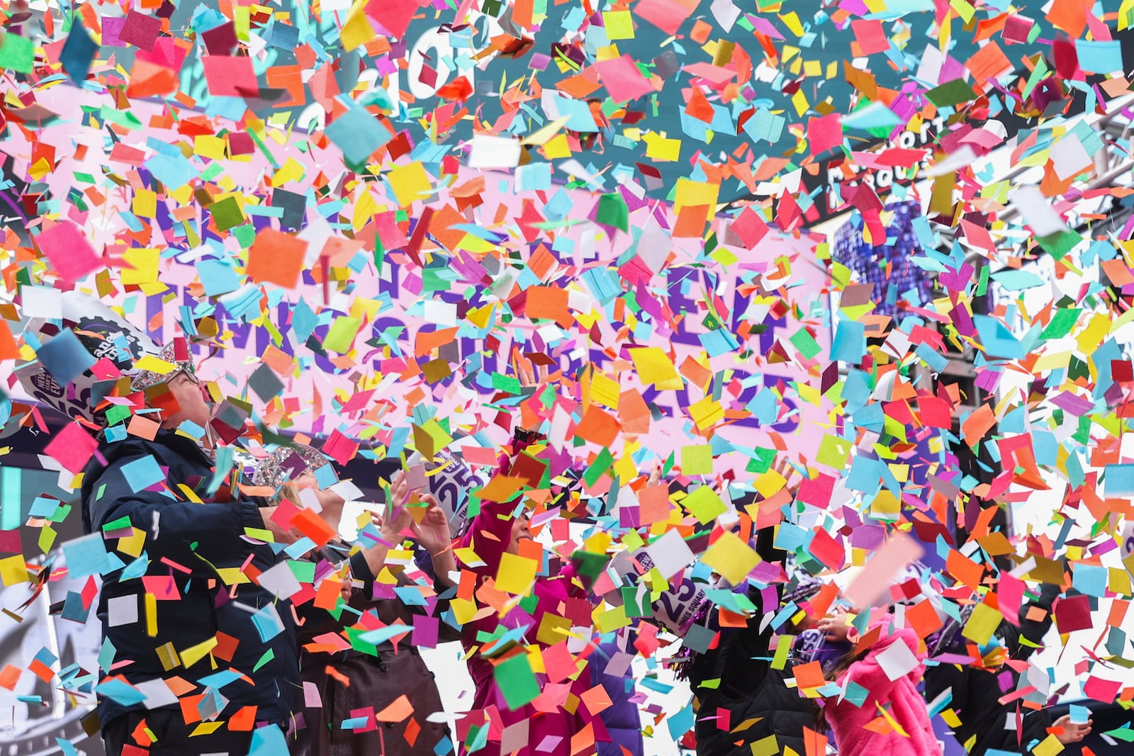 Organizers throw confetti ahead of New Year's Eve in Times Square, Sunday, Dec. 29, 2024, in New York. (AP Photo/Heather Khalifa)