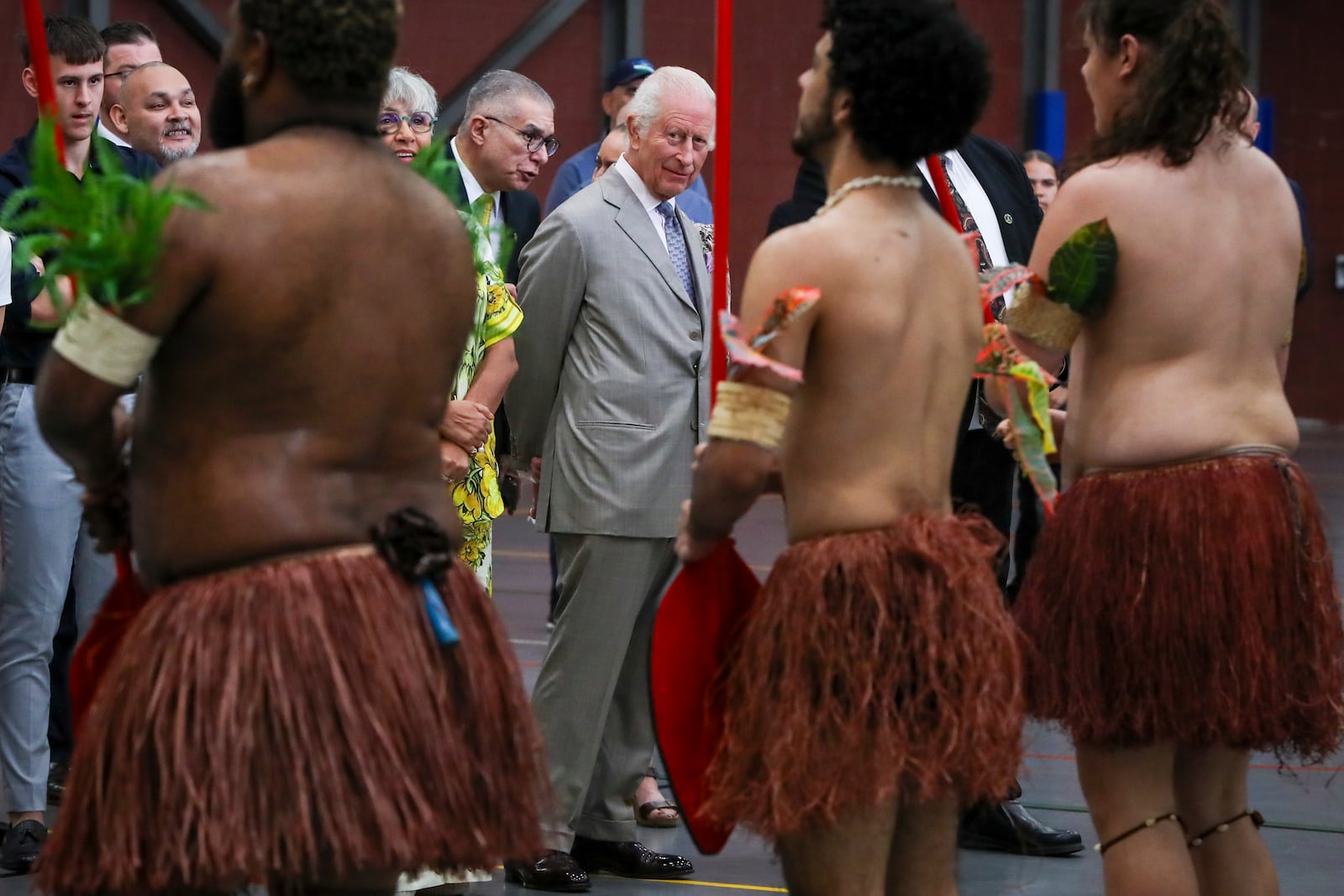 Britain's King Charles III watches a performance by the Mui Mui Bumer Gedlam group during a visit to the National Centre of Indigenous Excellence on Tuesday Oct. 22, 2024 in Sydney, Australia. (Lisa Maree Williams/Pool Photo via AP)