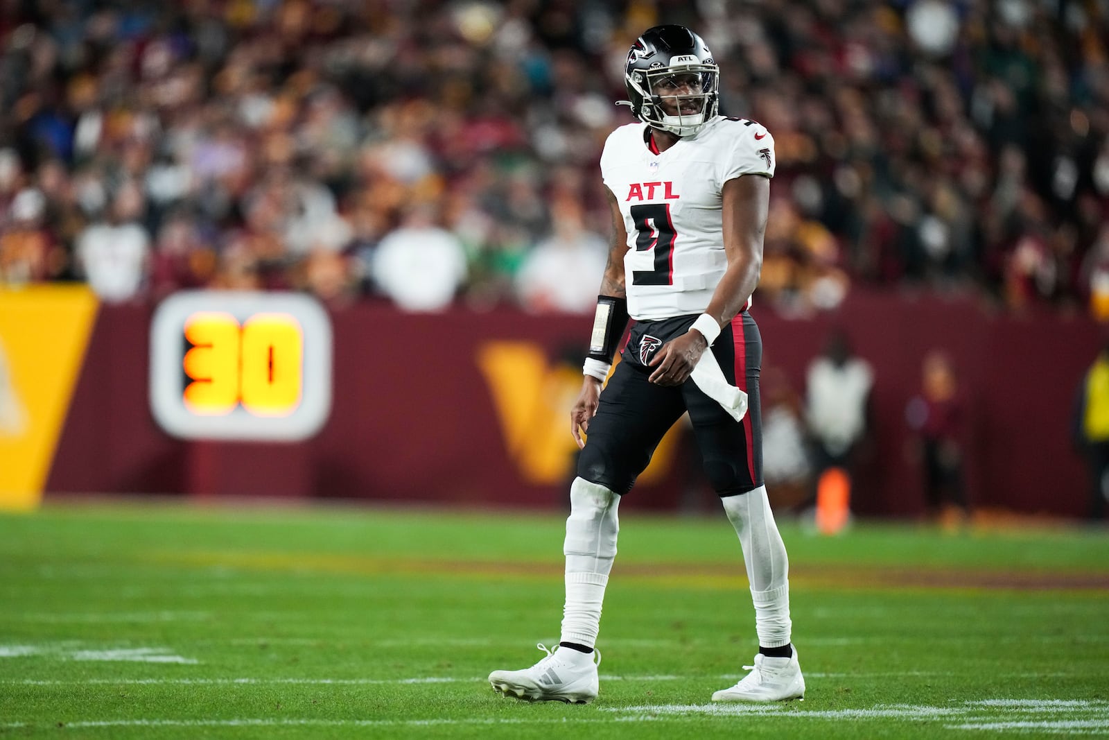 Atlanta Falcons quarterback Michael Penix Jr. (9) reacts during the second half of an NFL football game against the Washington Commanders, Sunday, Dec. 29, 2024, in Landover, Md. (AP Photo/Stephanie Scarbrough)