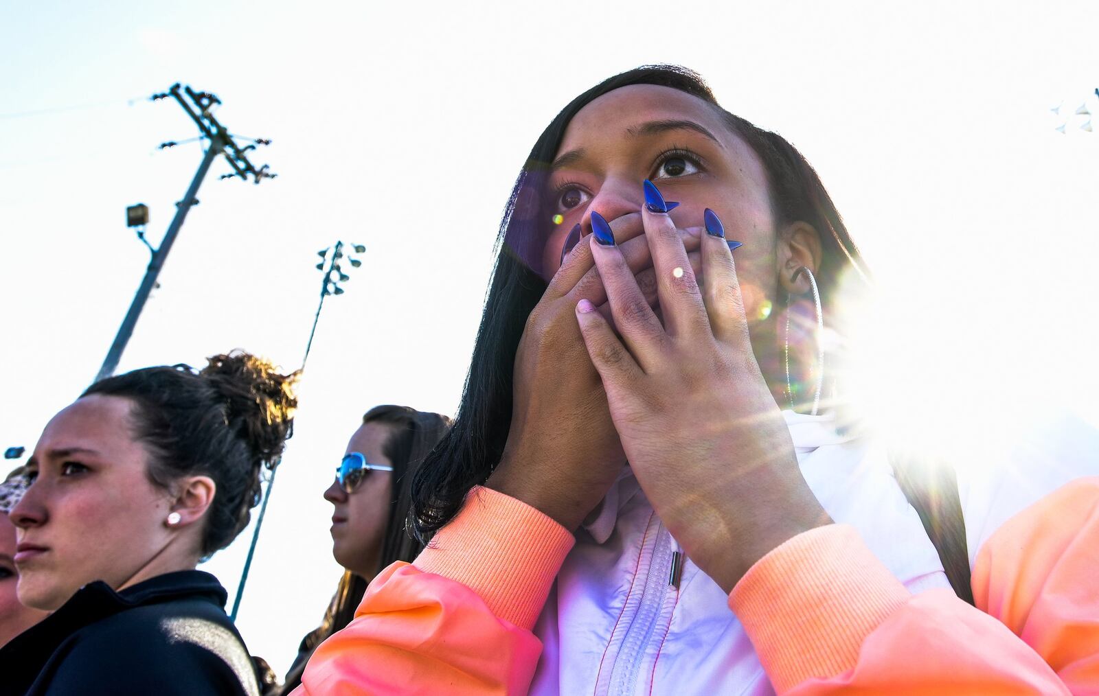 Hamilton High School senior Jordan Thompson reacts during a mock crash to share with students the dangers of distracted driving Wednesday, April 12 at Hamilton High School. NICK GRAHAM/STAFF