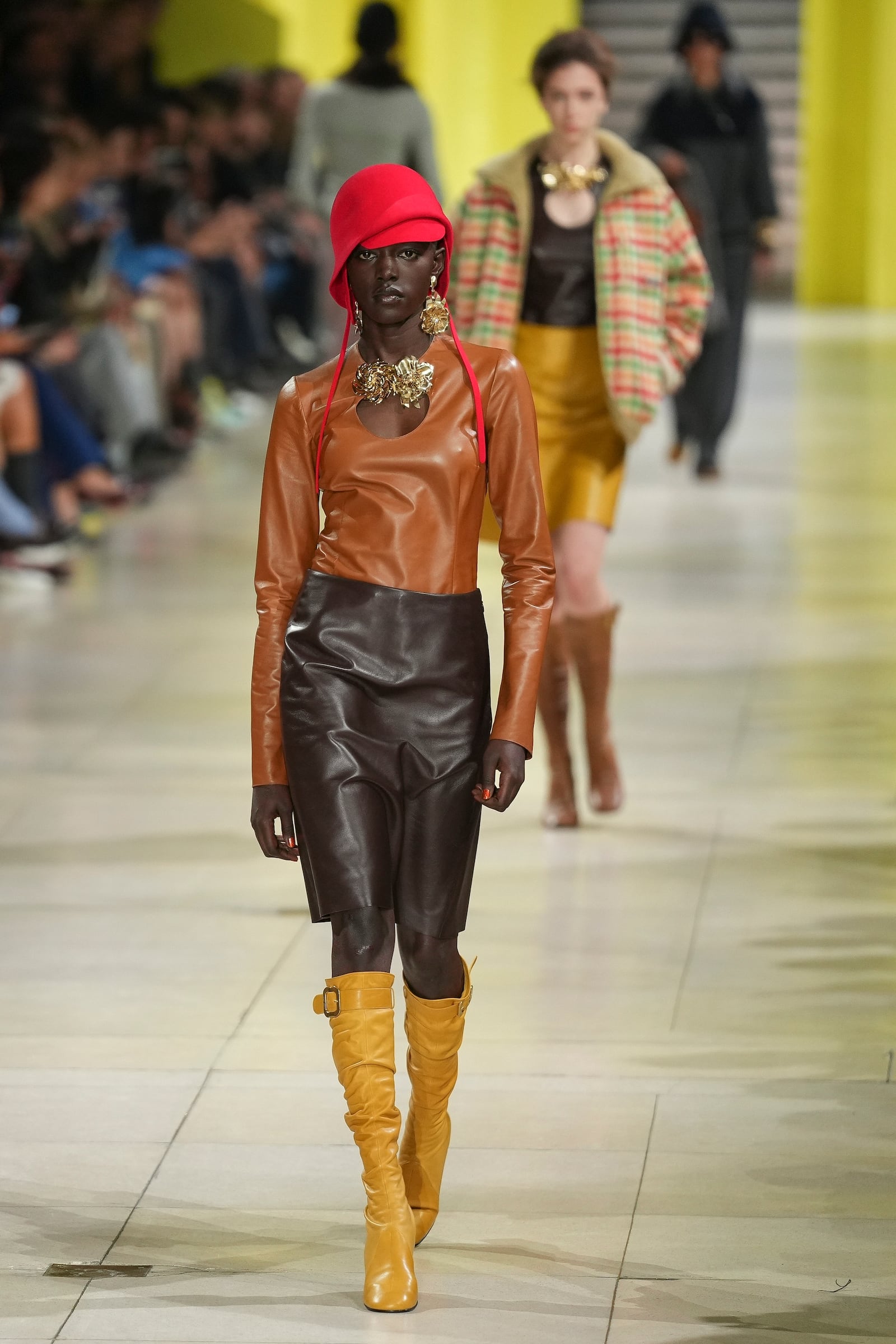 A model wears a creation as part of the Miu Miu Fall/Winter 2025-2026 Womenswear collection presented Tuesday, March 11, 2025. in Paris. (Photo by Scott A Garfitt/Invision/AP)