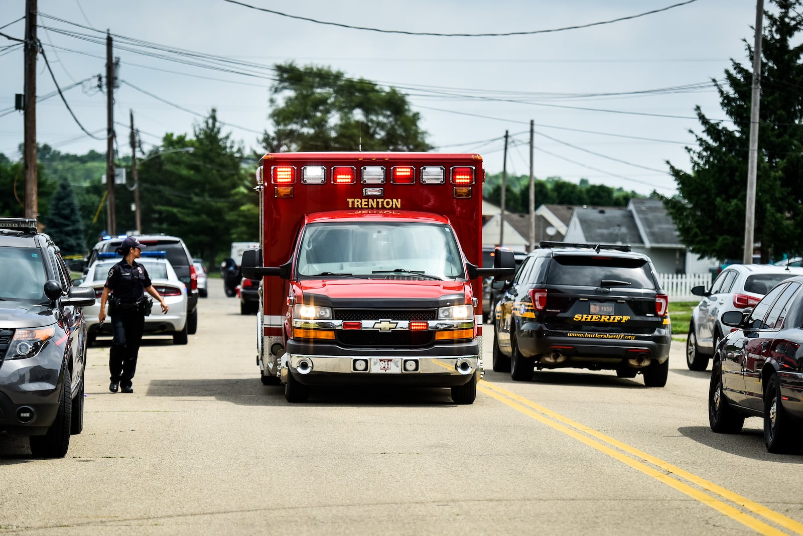 An ambulance leaves the scene of a two-hour standoff in Trenton.