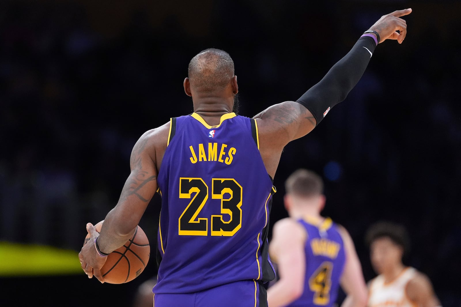 Los Angeles Lakers forward LeBron James gestures during the second half of an NBA basketball game against the Atlanta Hawks, Friday, Jan. 3, 2025, in Los Angeles. (AP Photo/Mark J. Terrill)