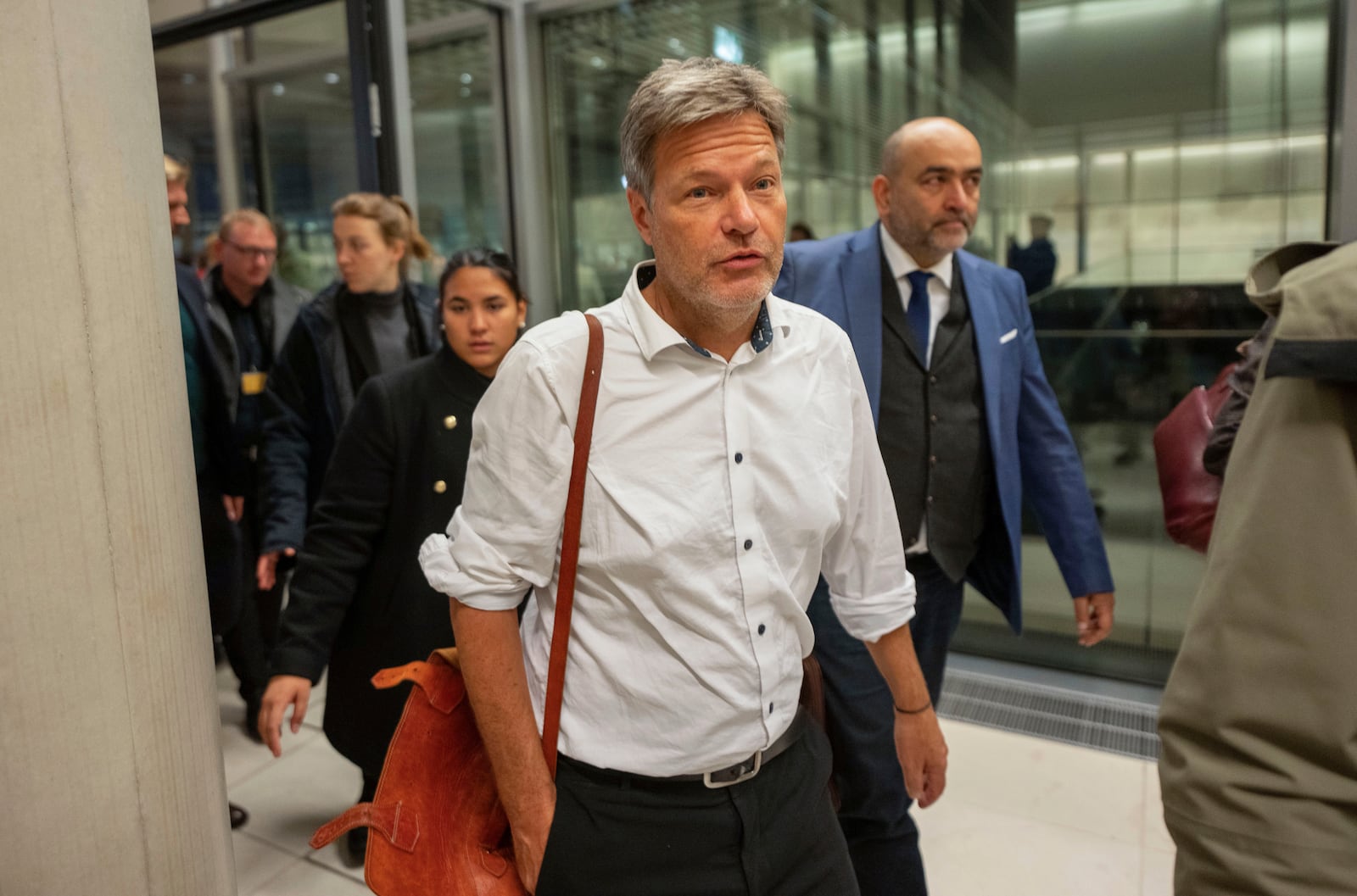 German Vice Chancellor and Economy and Climate Minister Robert Habeck, center, attends the parliamentary group meeting of the Greens in the Bundestag, in Berlin, Wednesday, Nov. 6, 2024. (Michael Kappeler/dpa via AP)