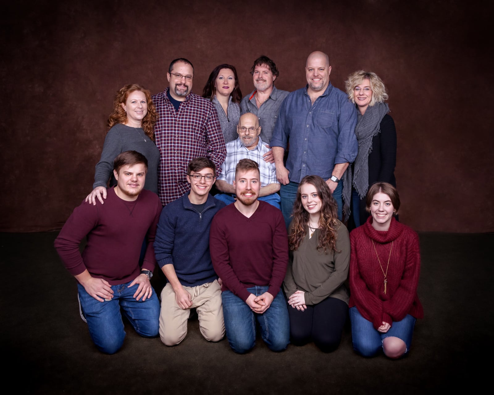 Michael Pate, of Hamilton, died on July 10, 2023, at the age of 77. He's pictured here with his sons, daughters-in-law and grandchildren. PROVIDED/THE PATE FAMILY