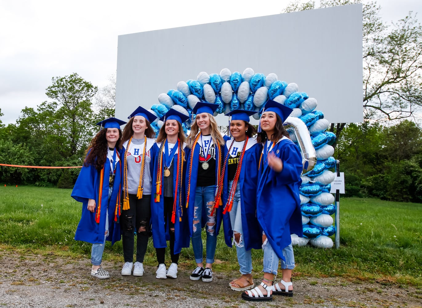 Hamilton High School seniors celebrate graduation at Holiday Auto Theatre drive-in