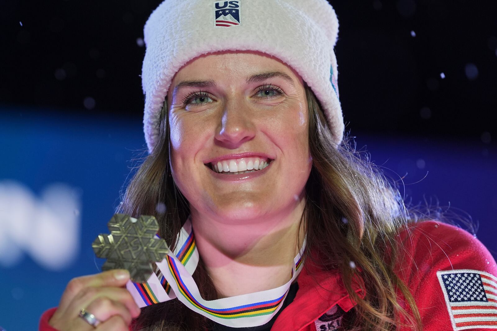 United States' Paula Moltzan shows her bronze medal for a women's giant slalom, at the Alpine Ski World Championships, in Saalbach-Hinterglemm, Austria, Thursday, Feb. 13, 2025. (AP Photo/Giovanni Auletta)