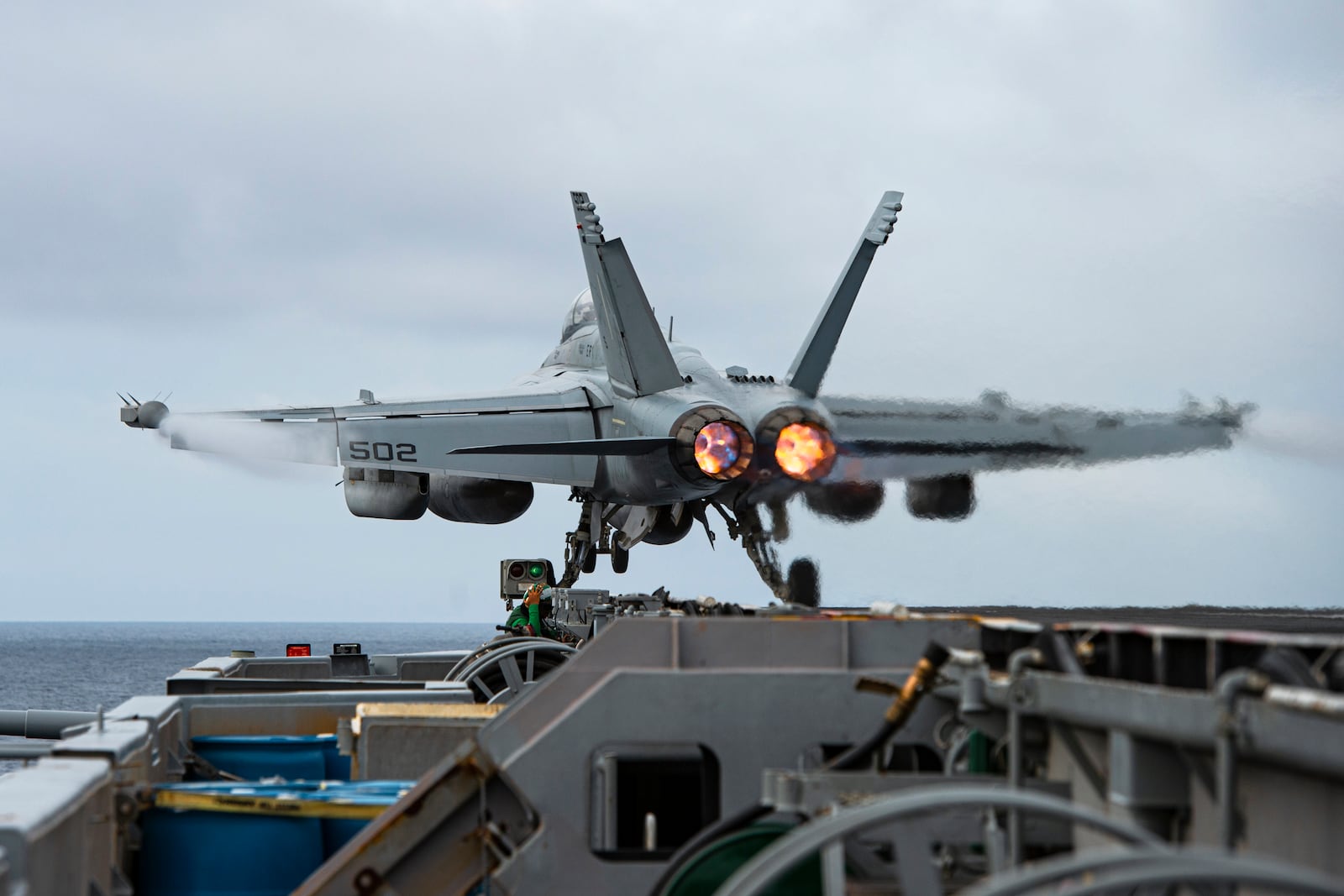 FILE - An E/A-18G Growler aircraft launches from the flight deck of the aircraft carrier USS Nimitz in the South China Sea, Sunday, Feb. 12, 2023. (Mass Communication Specialist 3rd Class Joseph Calabrese/U.S. Navy via AP, File)