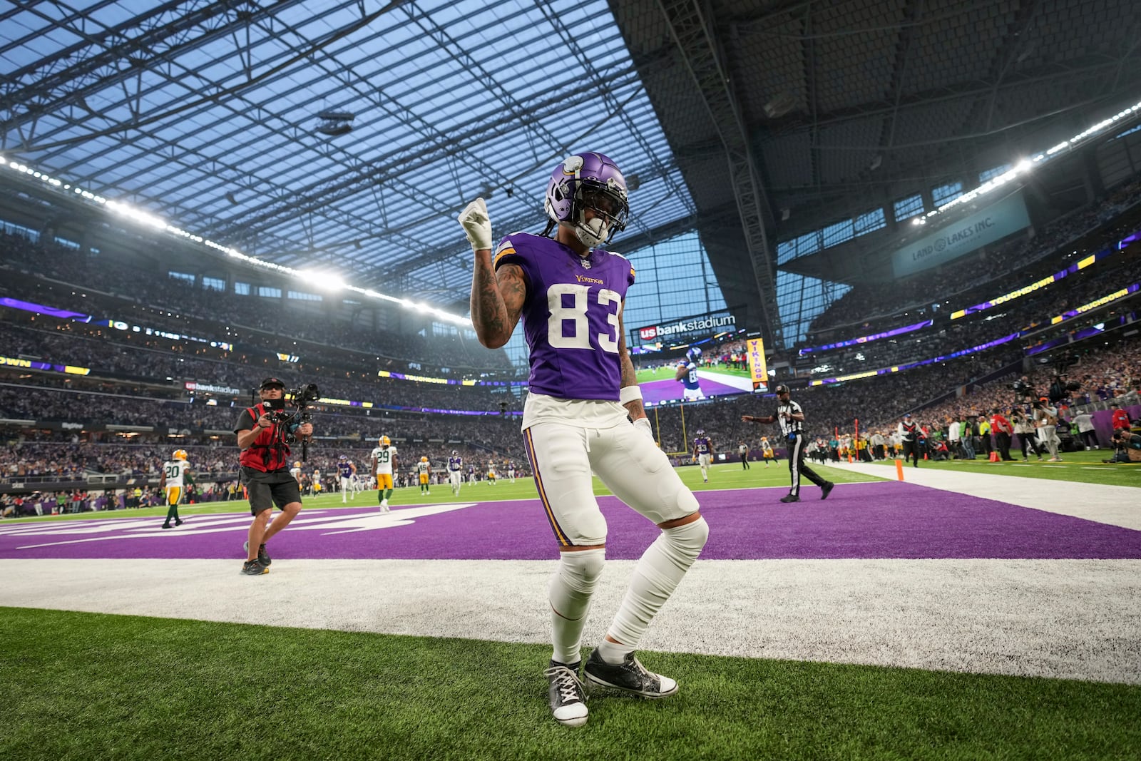 Minnesota Vikings' Jalen Nailor reacts after catching a touchdown pass during the first half of an NFL football game against the Green Bay Packers Sunday, Dec. 29, 2024, in Minneapolis. (AP Photo/Abbie Parr)