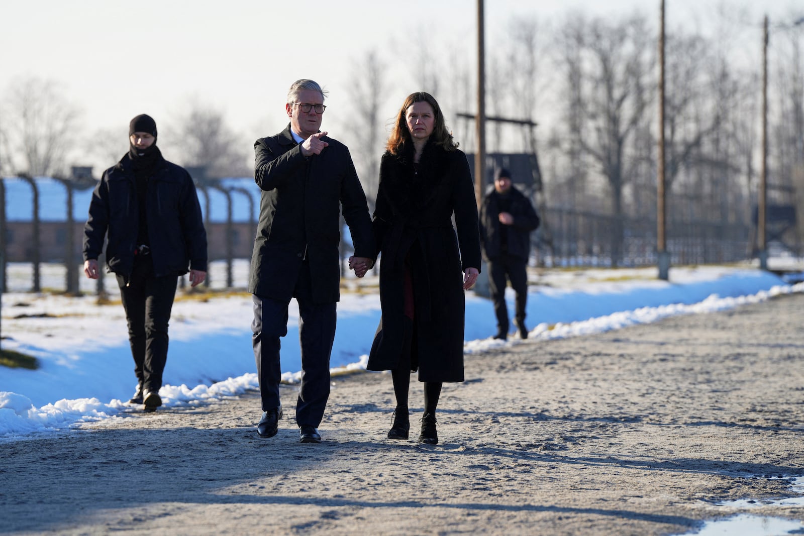 Britain's Prime Minister Keir Starmer and his wife Victoria Starmer visit the Memorial And Museum Auschwitz-Birkenau, a former Nazi German concentration and extermination camp, in Oswiecim, Poland, Friday Jan. 17, 2025. (Aleksandra Szmigiel/Pool via AP)