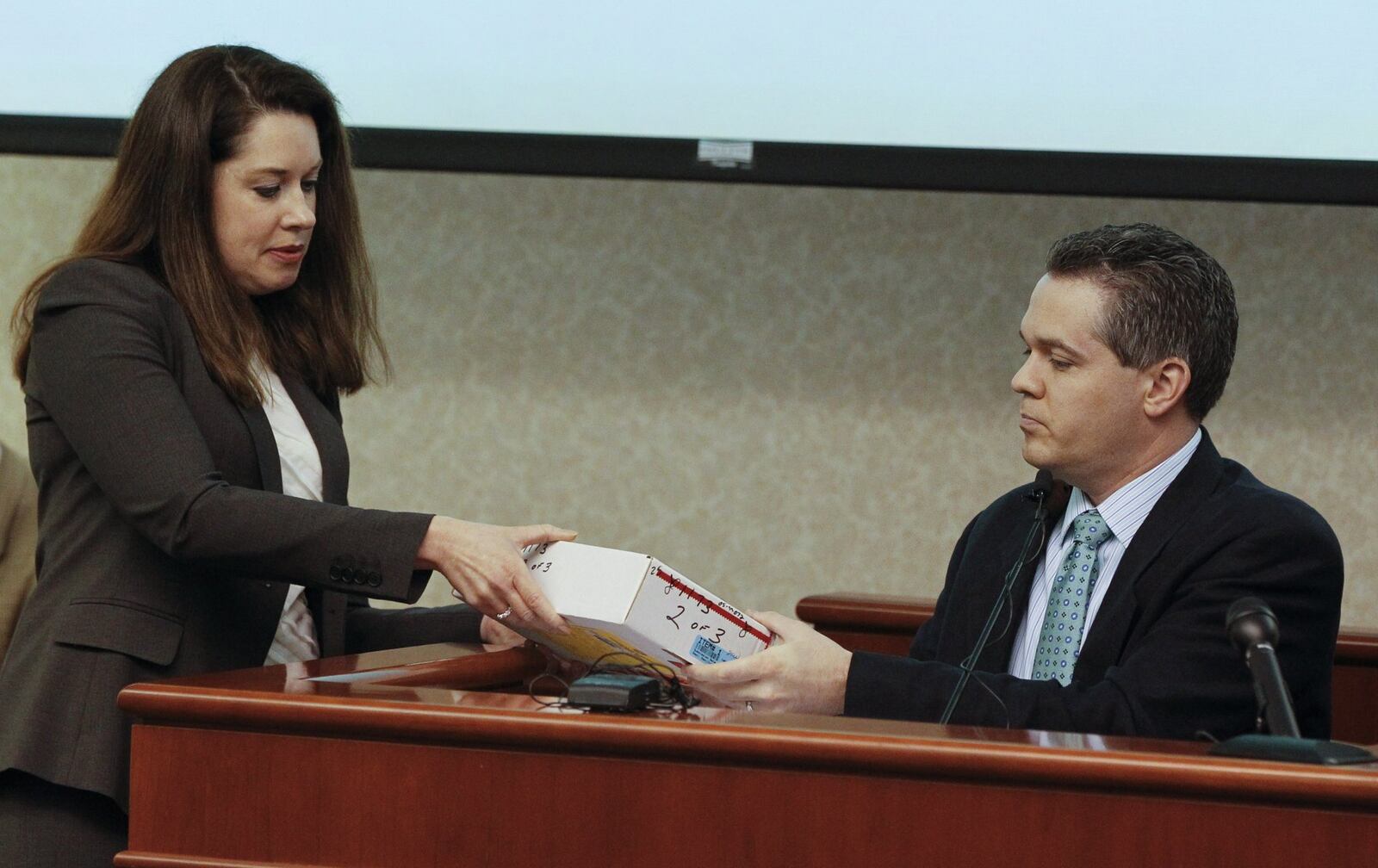 Butler County Assistant Prosecutor Jennifer McElfresh (left) received a meritorious prosecuting attorney award Thursday from the Ohio Prosecuting Attorneys Association.