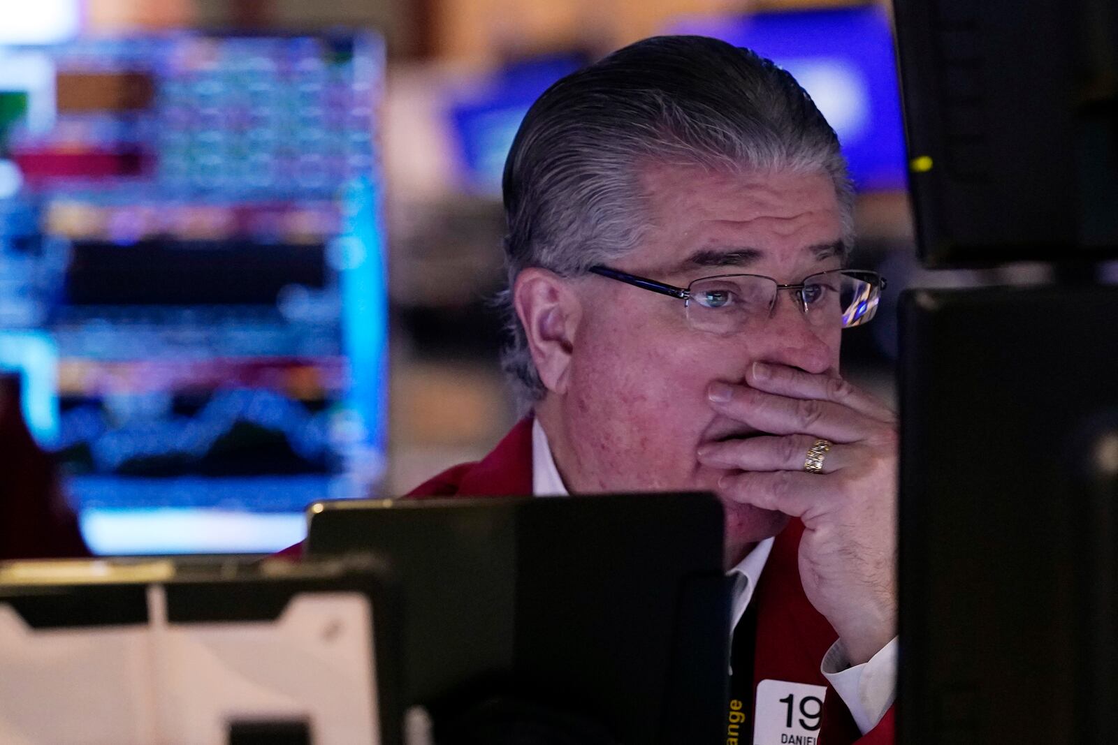 Trader Daniel Kryger works on the floor of the New York Stock Exchange, Tuesday, Feb. 4, 2025. (AP Photo/Richard Drew)