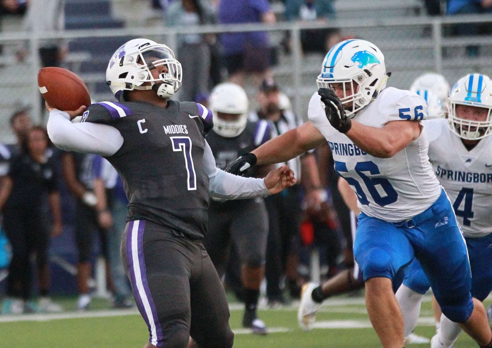 Middletown QB Kamari Fuller and Springboro defender Kaleb Priddy. Springboro defeated host Middletown 37-14 in a Week 2 high school football game at Barnitz Stadium on Friday, Sept. 7, 2019. MARC PENDLETON / STAFF