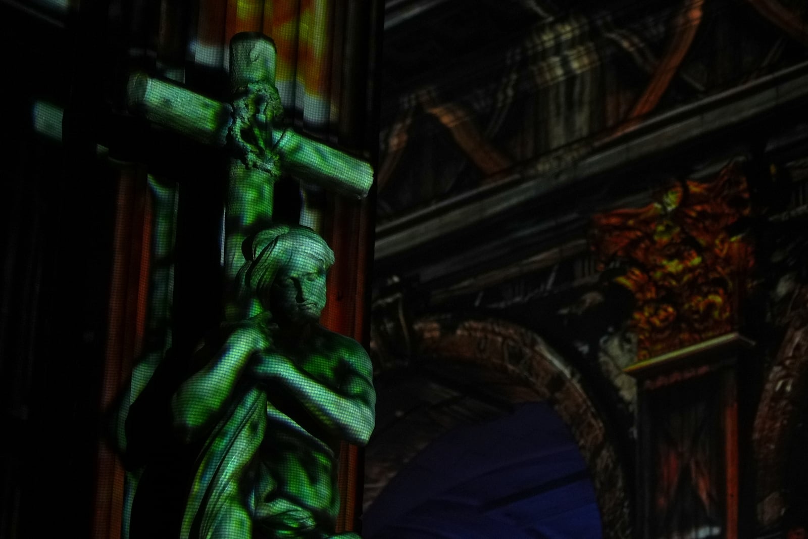 Video projections are seen Thursday Oct.31, 2024 at the Saint-Sulpice church in Paris. (AP Photo/Marine Lesprit)