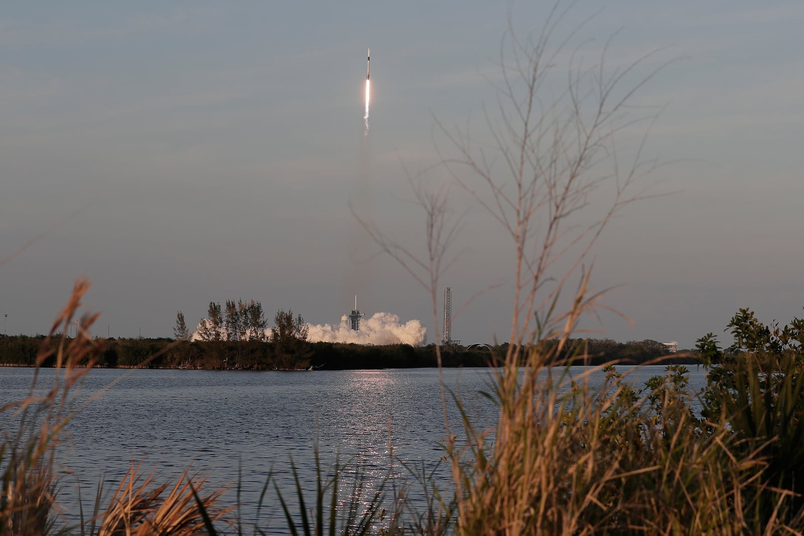 A SpaceX Falcon 9 rocket with a crew of four aboard the Crew Dragon spacecraft lifts off on a mission to the International Space Station from pad 39A at the Kennedy Space Center in Cape Canaveral, Fla., Friday, March 14, 2025. (AP Photo/Terry Renna)