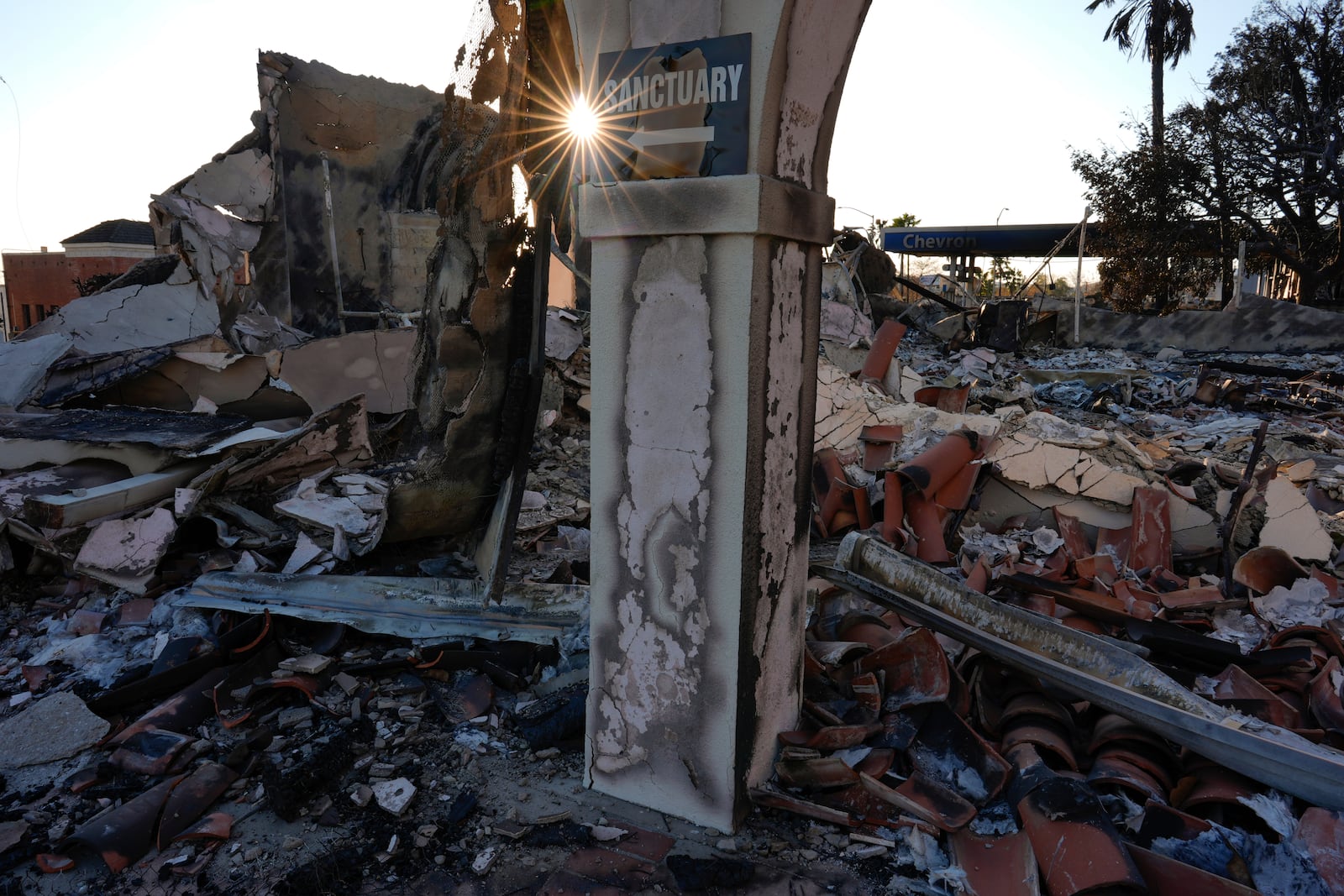 Damage is seen to the Altadena Community Church in the aftermath of the Eaton Fire, Monday, Jan. 13, 2025, in Altadena, Calif. (AP Photo/Carolyn Kaster)