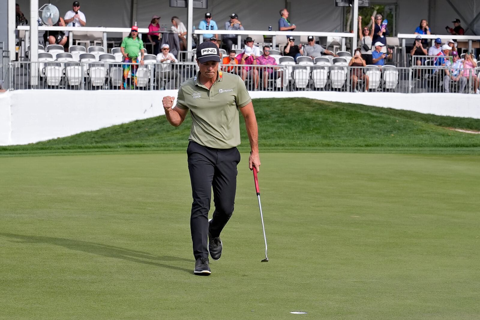 Viktor Hovland, of Norway, reacts to his his birdie putt on the 17th hole during the final round of the Valspar Championship golf tournament Sunday, March 23, 2025, at Innisbrook in Palm Harbor, Fla. (AP Photo/Chris O'Meara)