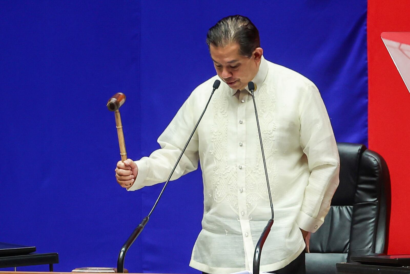 House Speaker Martin Romualdez gavels during the impeachment proceedings against Vice President Sara Duterte at the House of Representatives in Quezon City in Manila, Philippines, Wednesday, Feb.5, 2025. (AP Photo/Gerard Carreon)