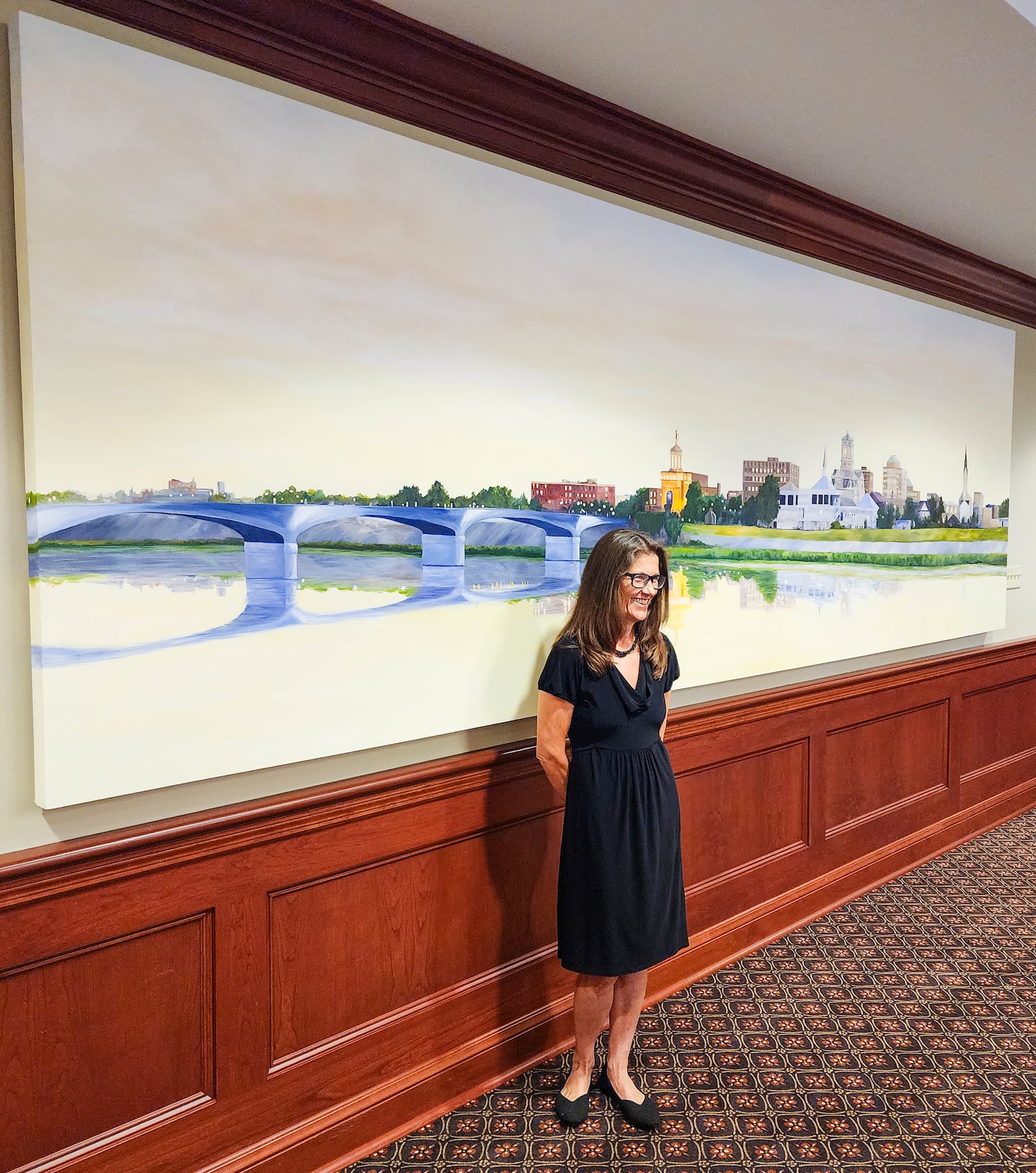 Artist Michelle Martin-McDulin created a painting that was unveiled Tuesday, Aug. 22, 2023 in the super courtroom at Butler County Common Pleas Court in Hamilton. The painting is 5 ft. tall and 15 ft. wide. NICK GRAHAM/STAFF