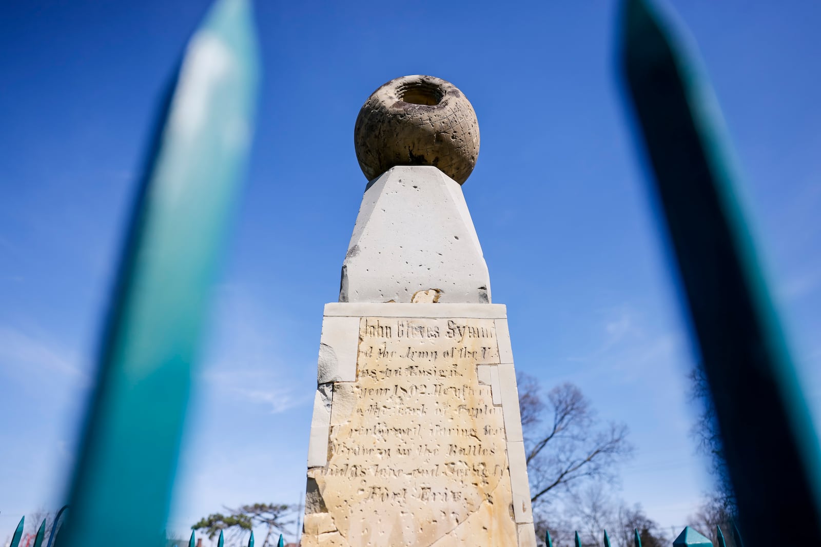 A monument for Capt. John Cleves Symmes stands in the middle of Symmes Park in Hamilton. The marker honors Symmes and his hollow earth theory. NICK GRAHAM/STAFF