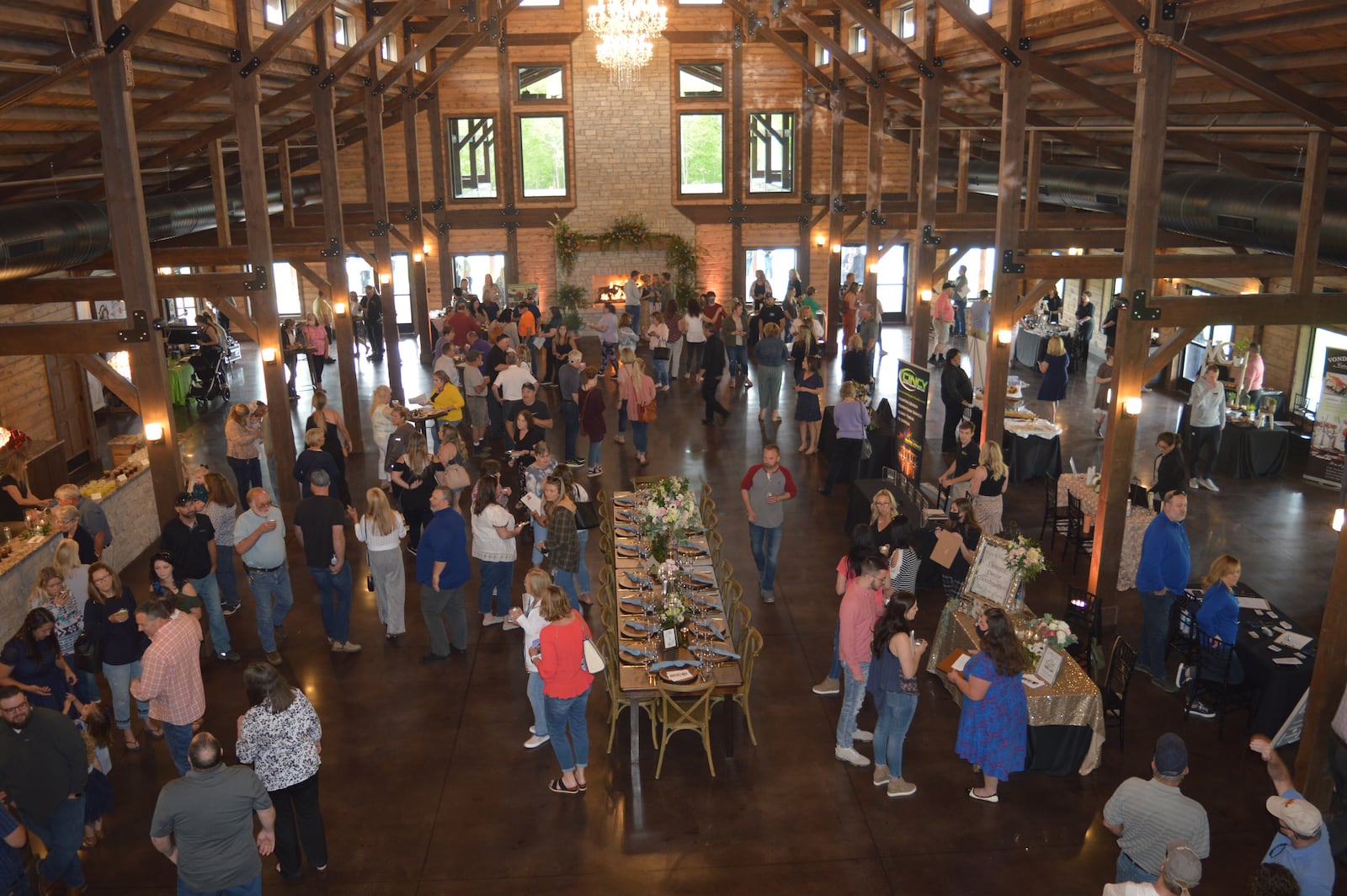 The size of the interior of the Hanover Reserve facility can be seen in this photo taken from the second-floor landing during the opening in May. A table was set as if for a reception or banquet with vendors set up on the right offering food samples and other services. CONTRIBUTED/BOB RATTERMAN