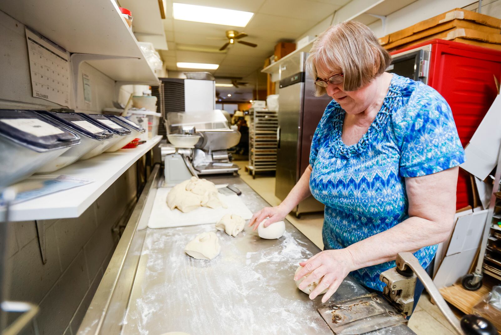 Karen Willis at Karen's Pizzeria is closing up shop after 24 years in business on Eaton Avenue in Hamilton. She is retiring but plans to work at Raymond's Pizza who will move in to the space she is in. NICK GRAHAM / STAFF 