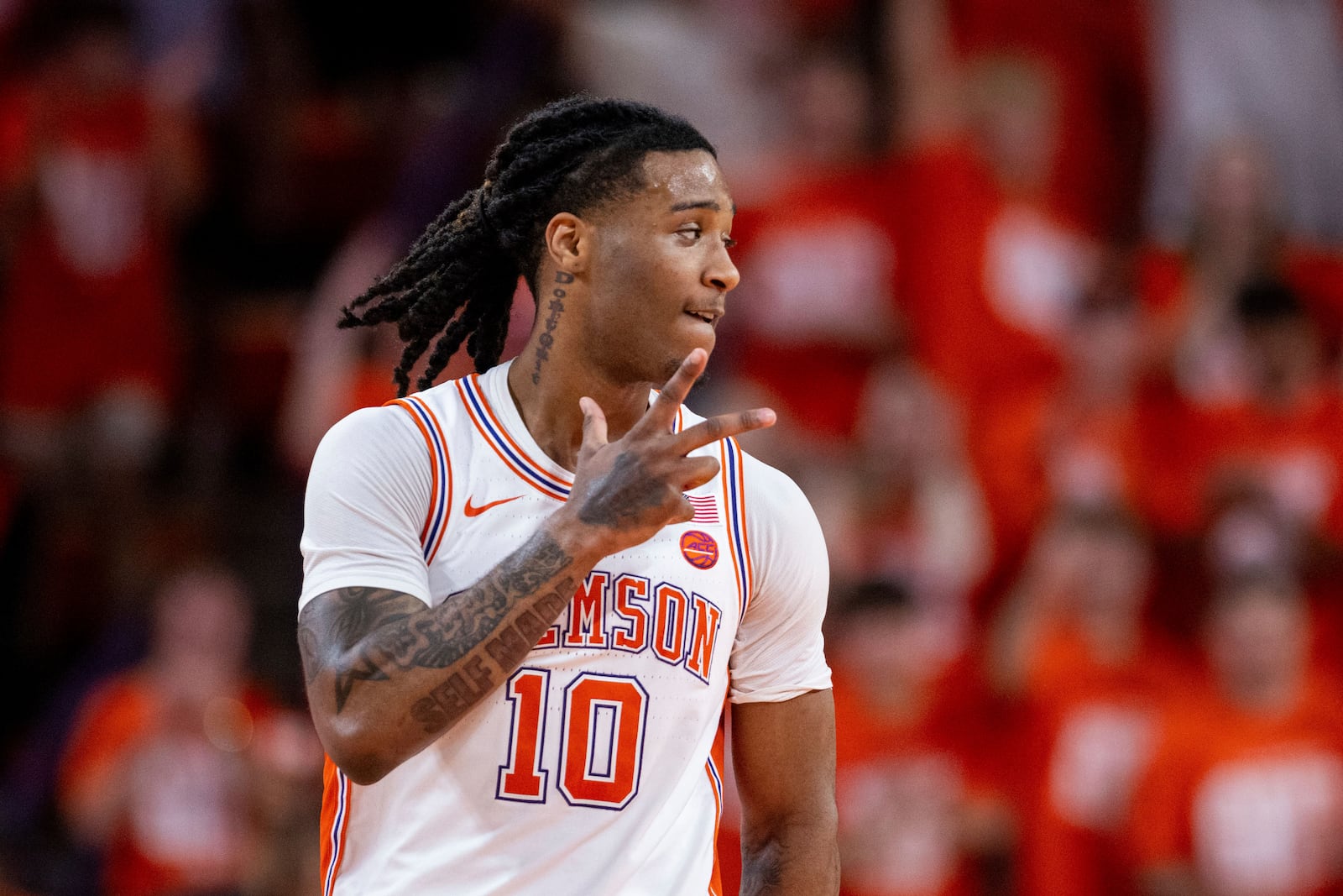 Clemson guard Del Jones (10) celebrates after a 3-point basket against Duke during the first half of an NCAA college basketball game Saturday, Feb. 8, 2025, in Clemson, S.C. (AP Photo/Scott Kinser)