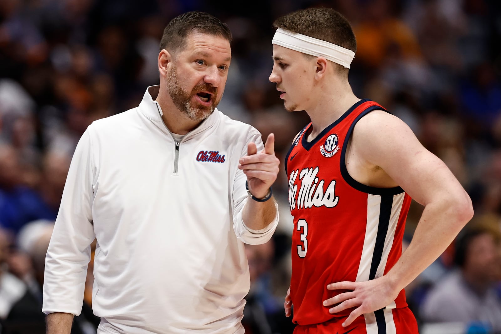 Mississippi head coach Chris Beard speaks with Sean Pedulla (3) during the second half of an NCAA college basketball game against the Auburn in the quarterfinal round of the Southeastern Conference tournament, Friday, March 14, 2025, in Nashville, Tenn. (AP Photo/Wade Payne)