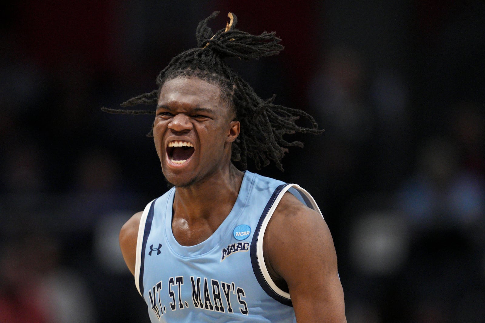 Mount St. Mary's forward Dola Adebayo reacts during the second half of a First Four college basketball game against American University in the NCAA Tournament, Tuesday, March 19, 2025, in Dayton, Ohio. (AP Photo/Jeff Dean)