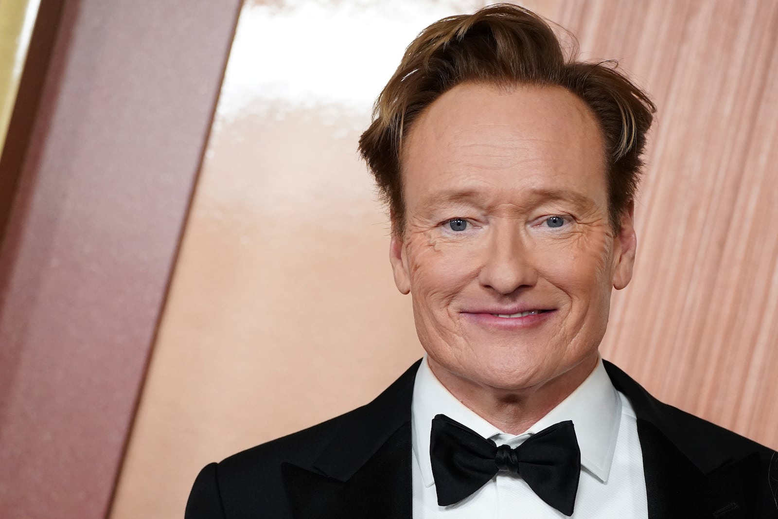 Conan O'Brien arrives at the Oscars on Sunday, March 2, 2025, at the Dolby Theatre in Los Angeles. (Photo by Jordan Strauss/Invision/AP)