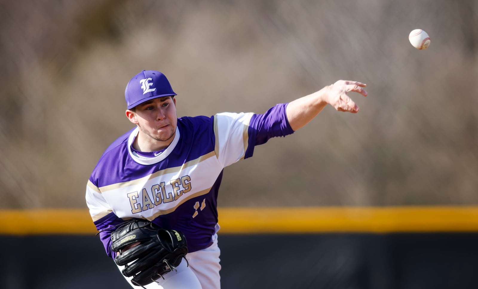 Eaton's Carson Brower pitches during their baseball game against Madison Wednesday, March 29, 2023 at Madison High School. Eaton won 13-1. Brower, who was born with a limb difference, pitches left handed then shifts his glove to his left hand to catch. Brower plans to play baseball at Bellarmine University after high school. NICK GRAHAM/STAFF