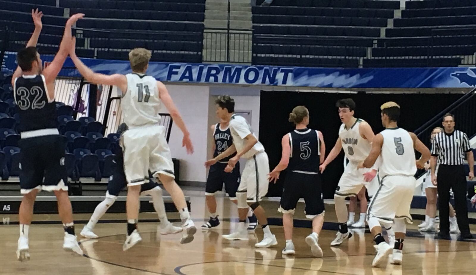 Valley View’s Ben Herman (32) launches a 3-pointer over Badin’s Kyle Young (11) on Saturday afternoon during Division II sectional play at Fairmont’s Trent Arena. RICK CASSANO/STAFF