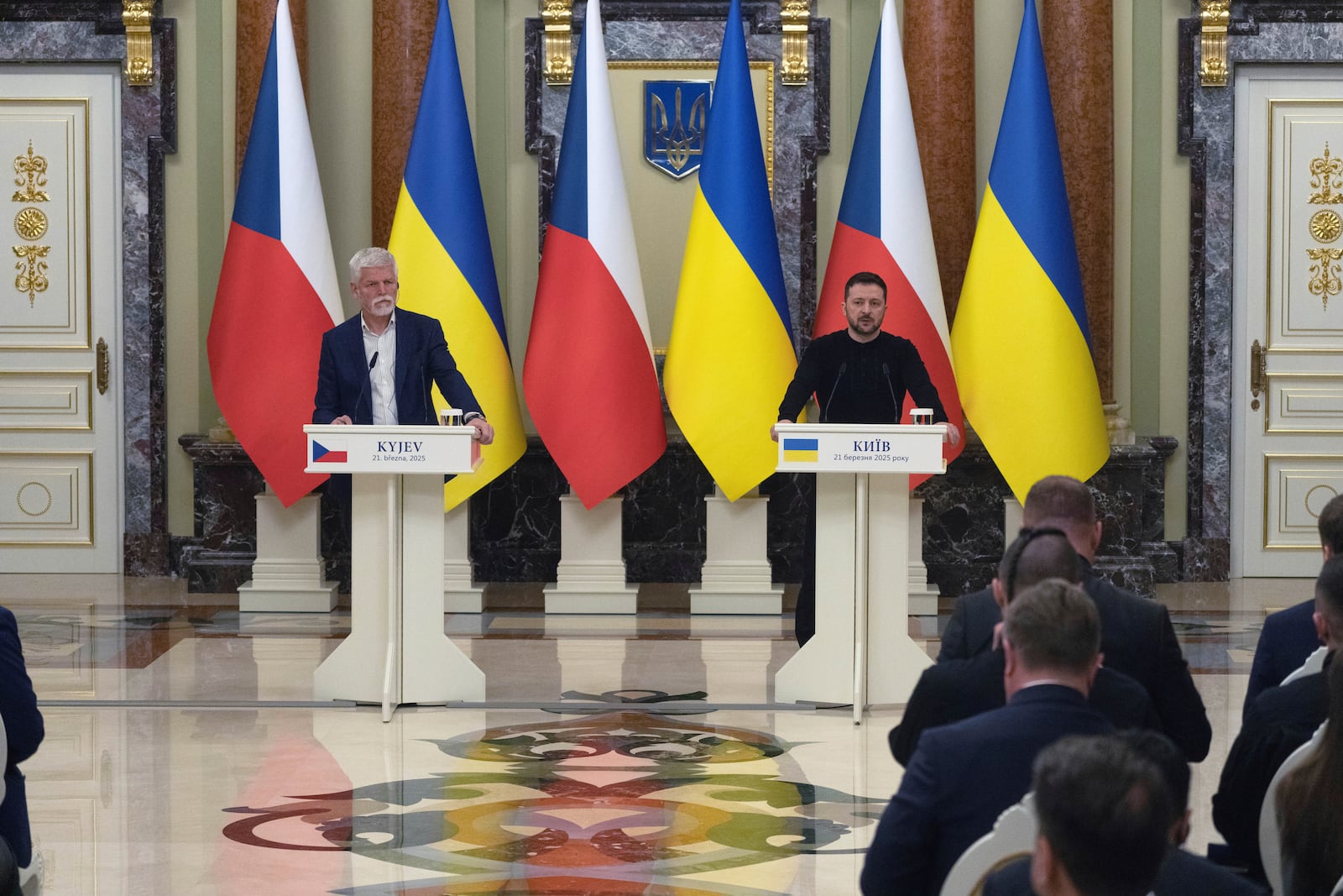 Ukrainian President Volodymyr Zelenskyy, right, and Czech Rebublic's President Petr Pavel speak during joint press conference in Kyiv, Ukraine, Friday, March 21, 2025. (AP Photo/Efrem Lukatsky).