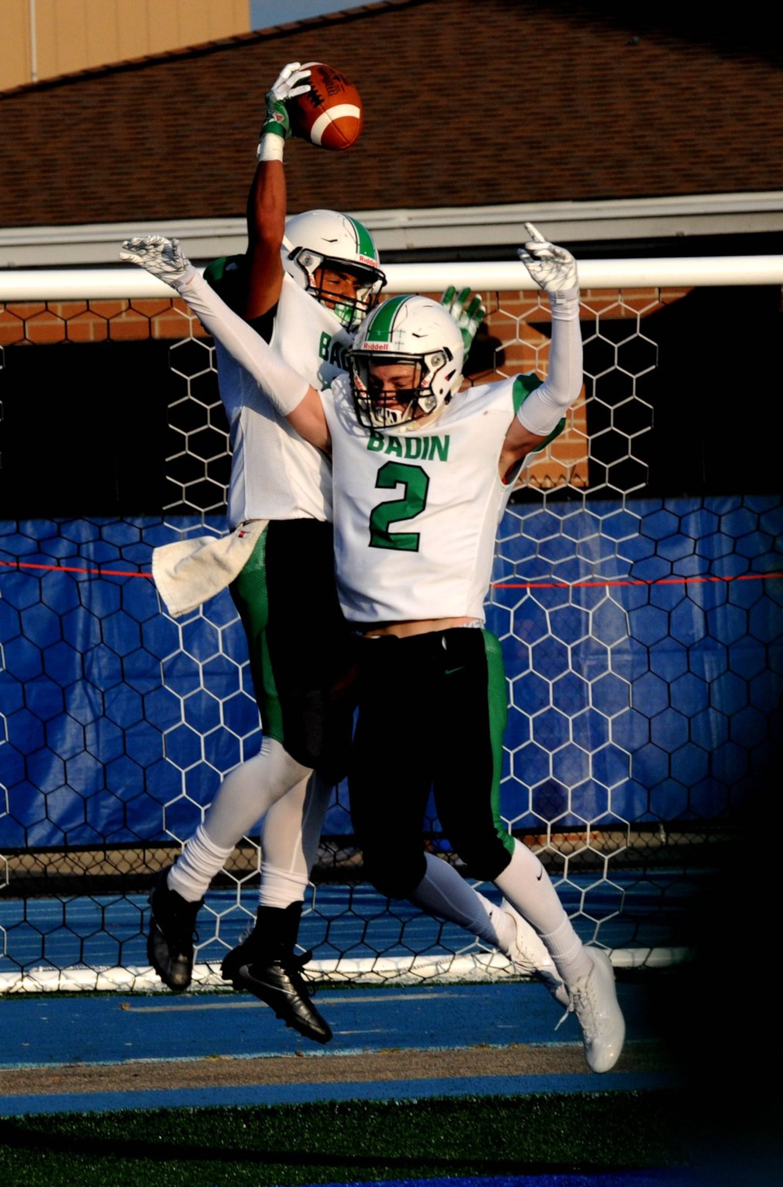 Badin’s Davon Starks (1) and Pat Mignery (2) celebrate after Starks caught a 36-yard touchdown pass from Jordan Flaig on Friday night in a 36-6 win over Ross in the Skyline Chili Crosstown Showdown at Hamilton’s Virgil Schwarm Stadium. CONTRIBUTED PHOTO BY DAVID A. MOODIE