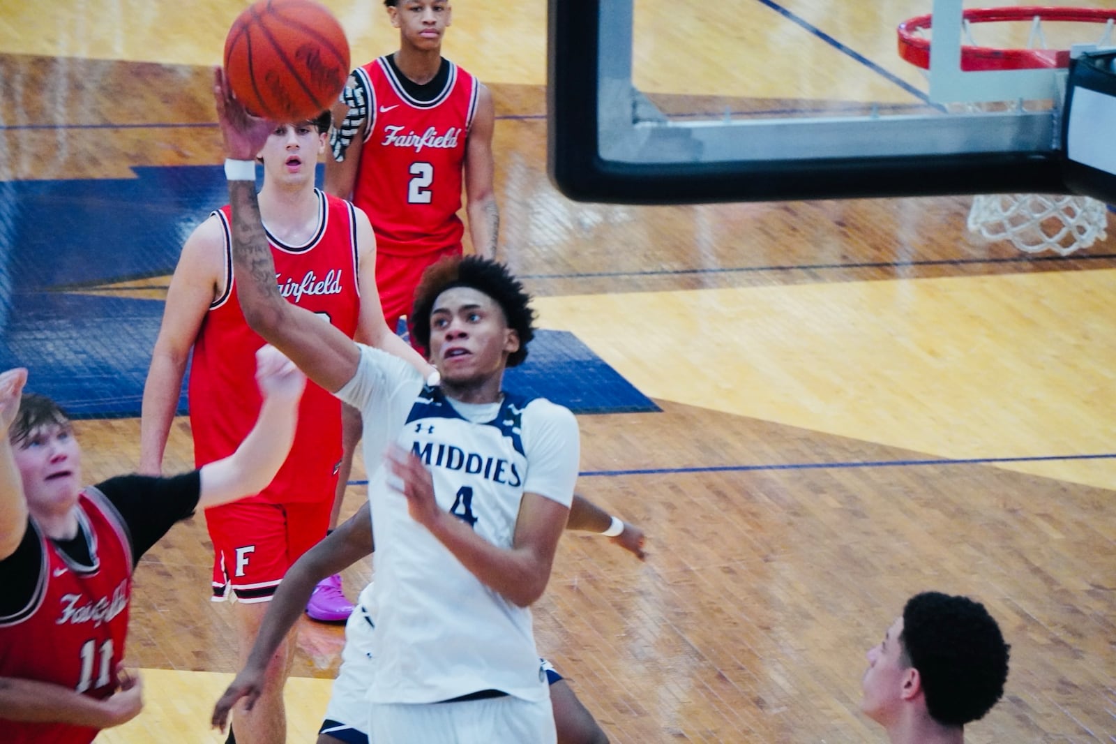 Middletown's Chandler Shields (4) pulls down a rebound on Friday night at Wade E. Miller Arena. Chris Vogt/CONTRIBUTED