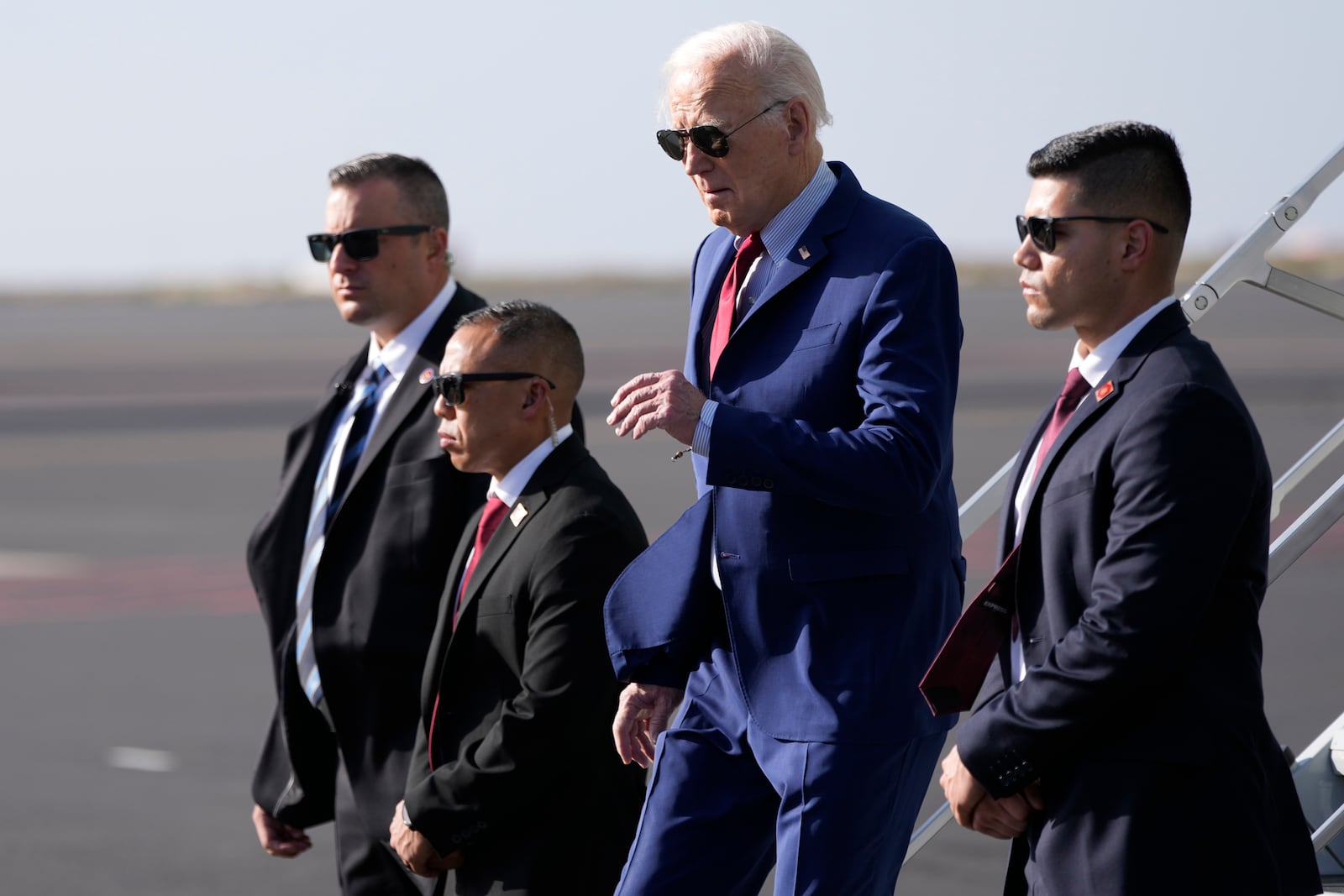 President Joe Biden arrives at Amilcar Cabral international airport on Sal island, Cape Verde Monday, Dec. 2, 2024, en route to Angola as he makes his long-promised visit to Africa. (AP Photo/Ben Curtis)