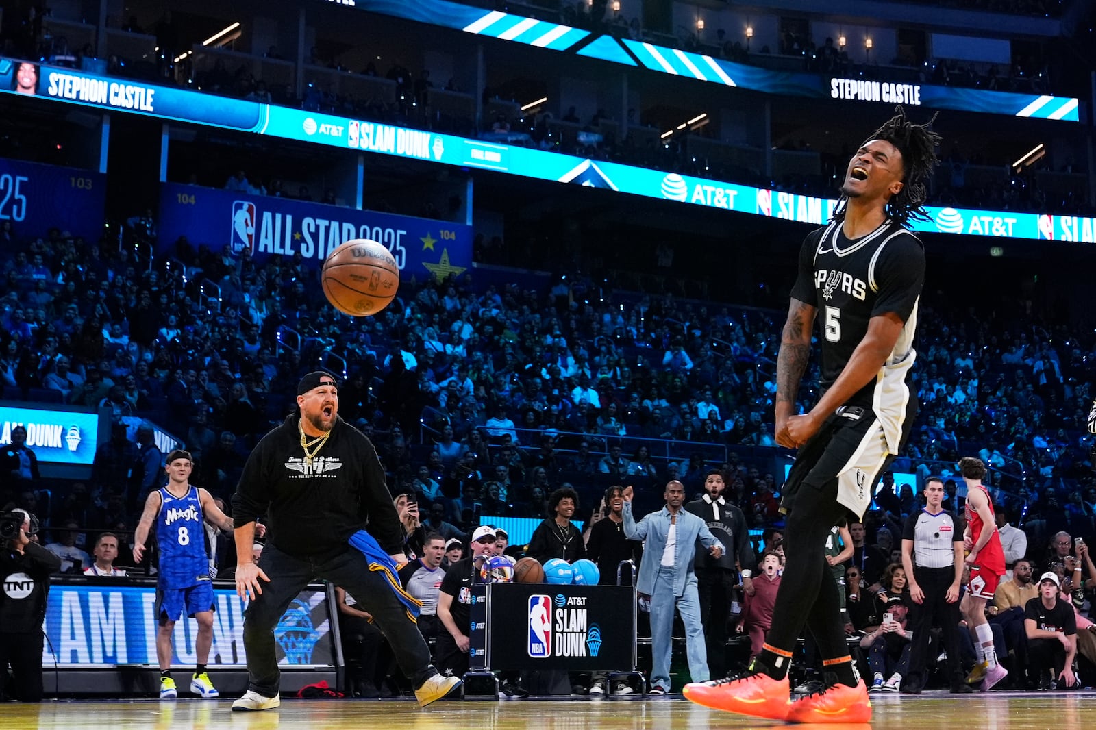 San Antonio Spurs guard Stephon Castle reacts after dunking during the slam dunk contest at the NBA basketball All-Star Saturday night festivities Saturday, Feb. 15, 2025, in San Francisco. (AP Photo/Godofredo A. Vásquez)