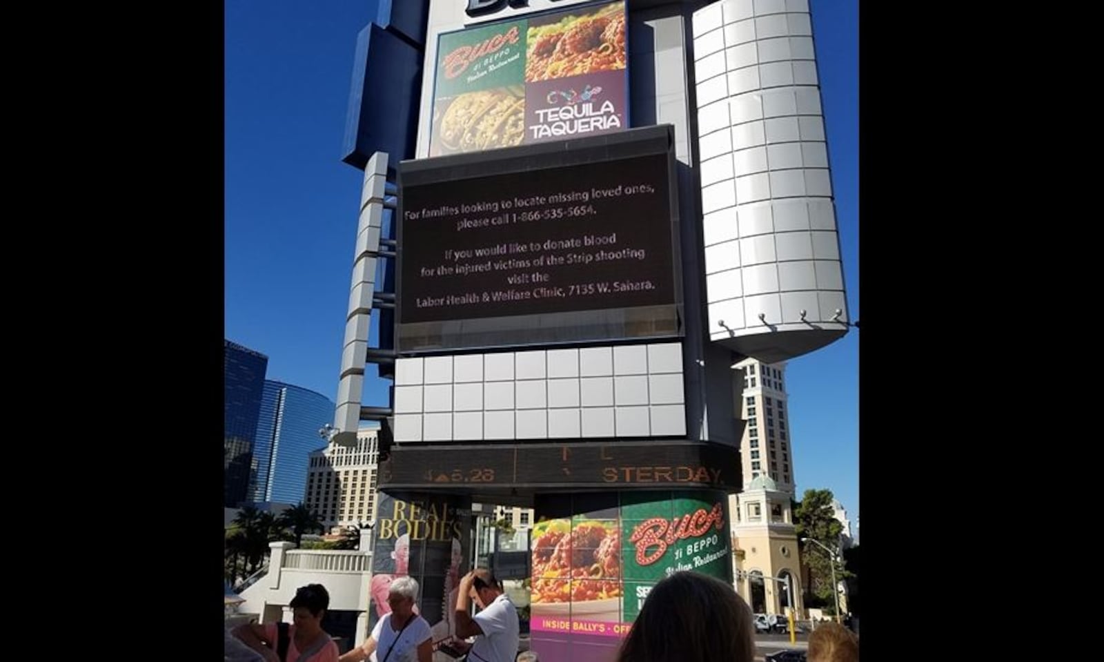 A message attempting to reconnect families with missing loved ones appears on a Las Vegas strip-billboard Monday afternoon. Jen Rupert/Contributed photo