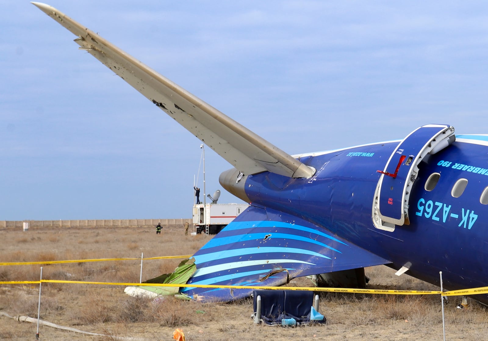 This image from video released by the administration of the Mangystau region of Kazakhstan, shows the wreckage of Azerbaijan Airlines Embraer 190 on the ground near the airport of Aktau, Kazakhstan, Wednesday, Dec. 25, 2024. (Administration of the Mangystau Region via AP)