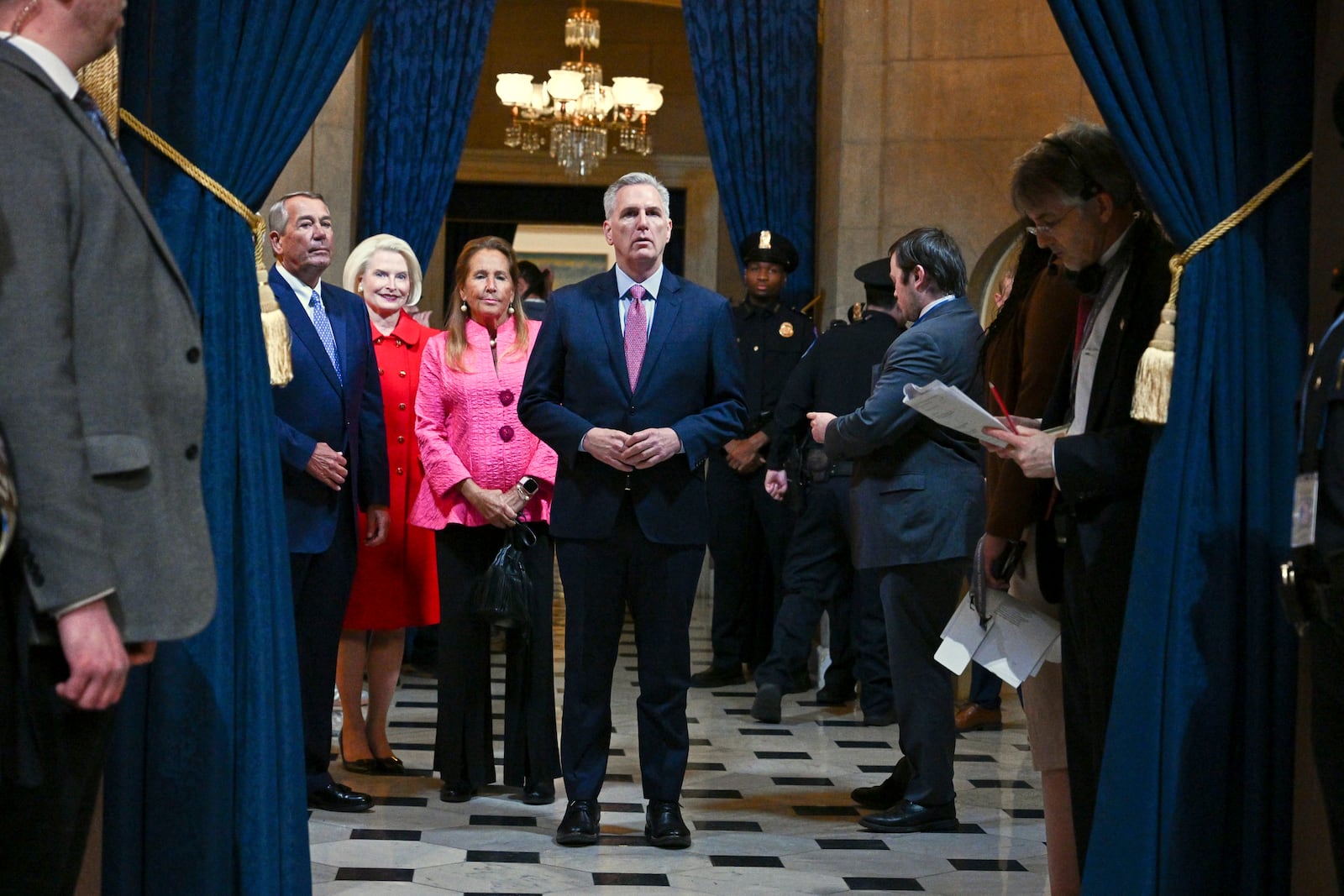 From left, former Speaker of the House John Boehner, Callista Gingrich, Debbie Boehner and former speaker of the House Kevin McCarthy arrive before the 60th Presidential Inauguration in the Rotunda of the U.S. Capitol in Washington, Monday, Jan. 20, 2025. (Ricky Carioti/The Washington Post via AP, Pool)