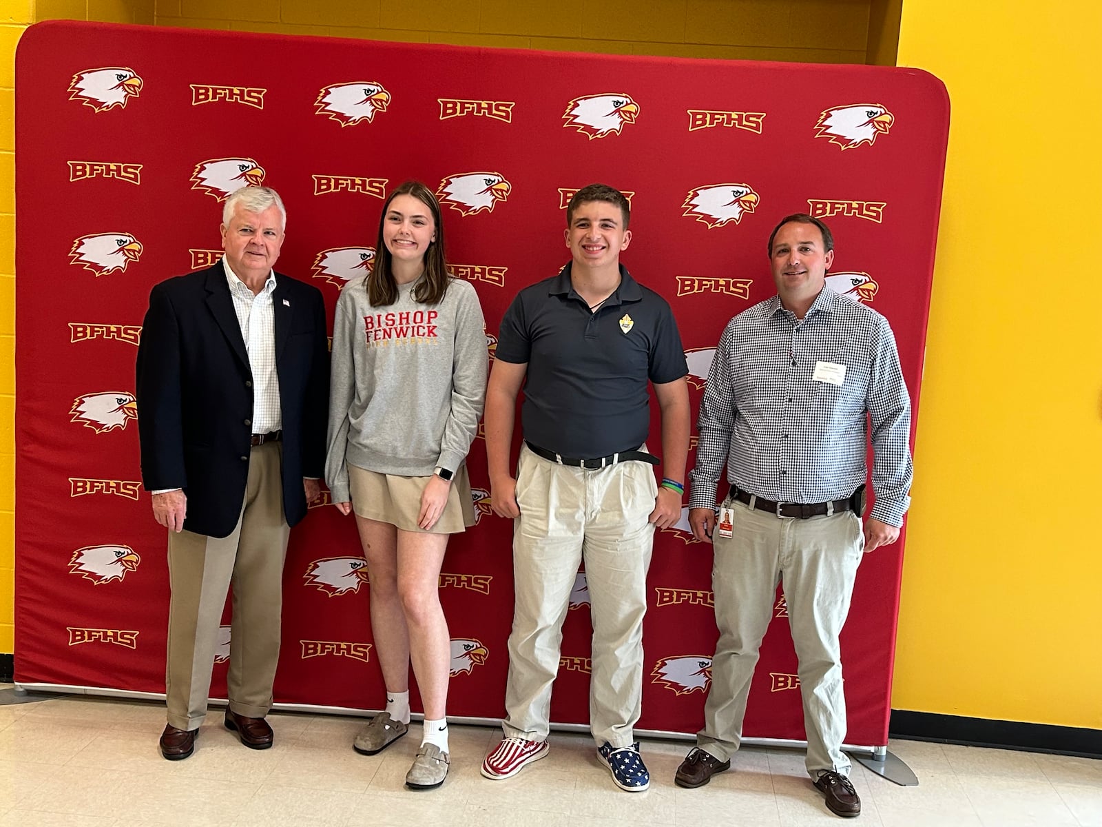 Pete Dobrozsi, left, and his nephew, Evan, far right, stand with the two Dobrozsi Family Scholarship winners, Emma Crawford and Jerod Ryan, Wednesday after the Scholarship Breakfast. All the scholarship winners were photographed with the donors. RICK MCCRABB/CONTRIBUTING WRITER