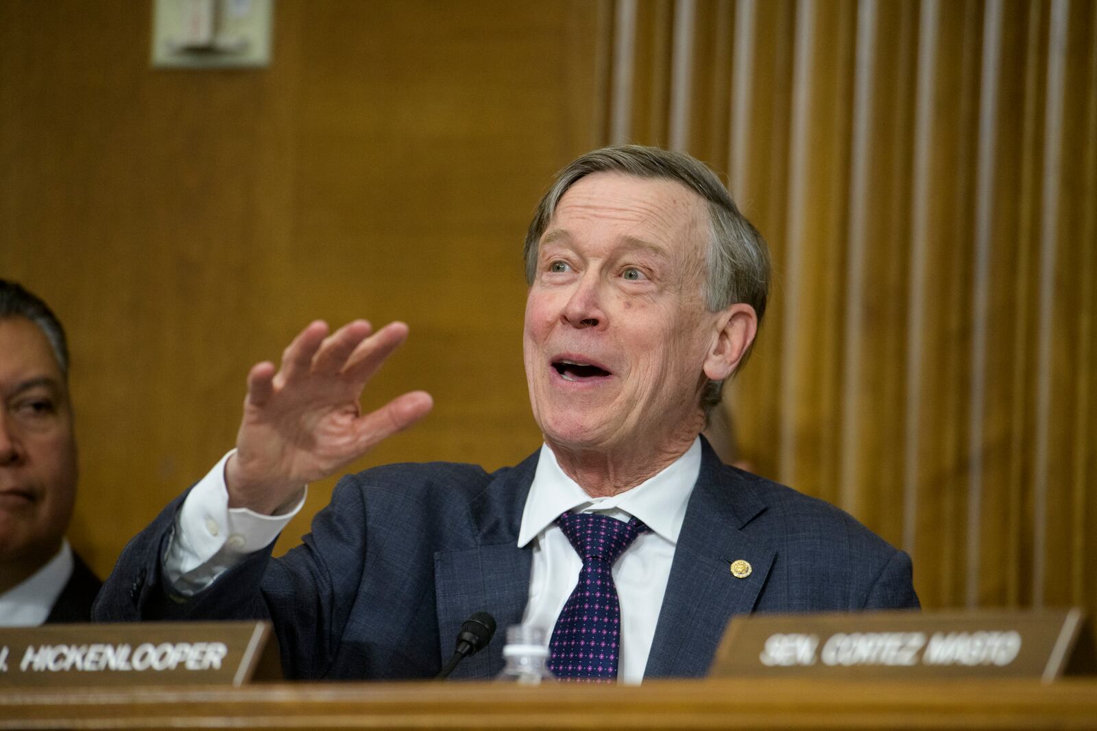 Sen. John Hickenlooper, D-Colo., introduces Chris Wright, President-elect Donald Trump's nominee to be Secretary of Energy during a Senate Committee on Energy and Natural Resources hearing for his pending confirmation on Capitol Hill, Wednesday, Jan. 15, 2025, in Washington. (AP Photo/Rod Lamkey, Jr.)