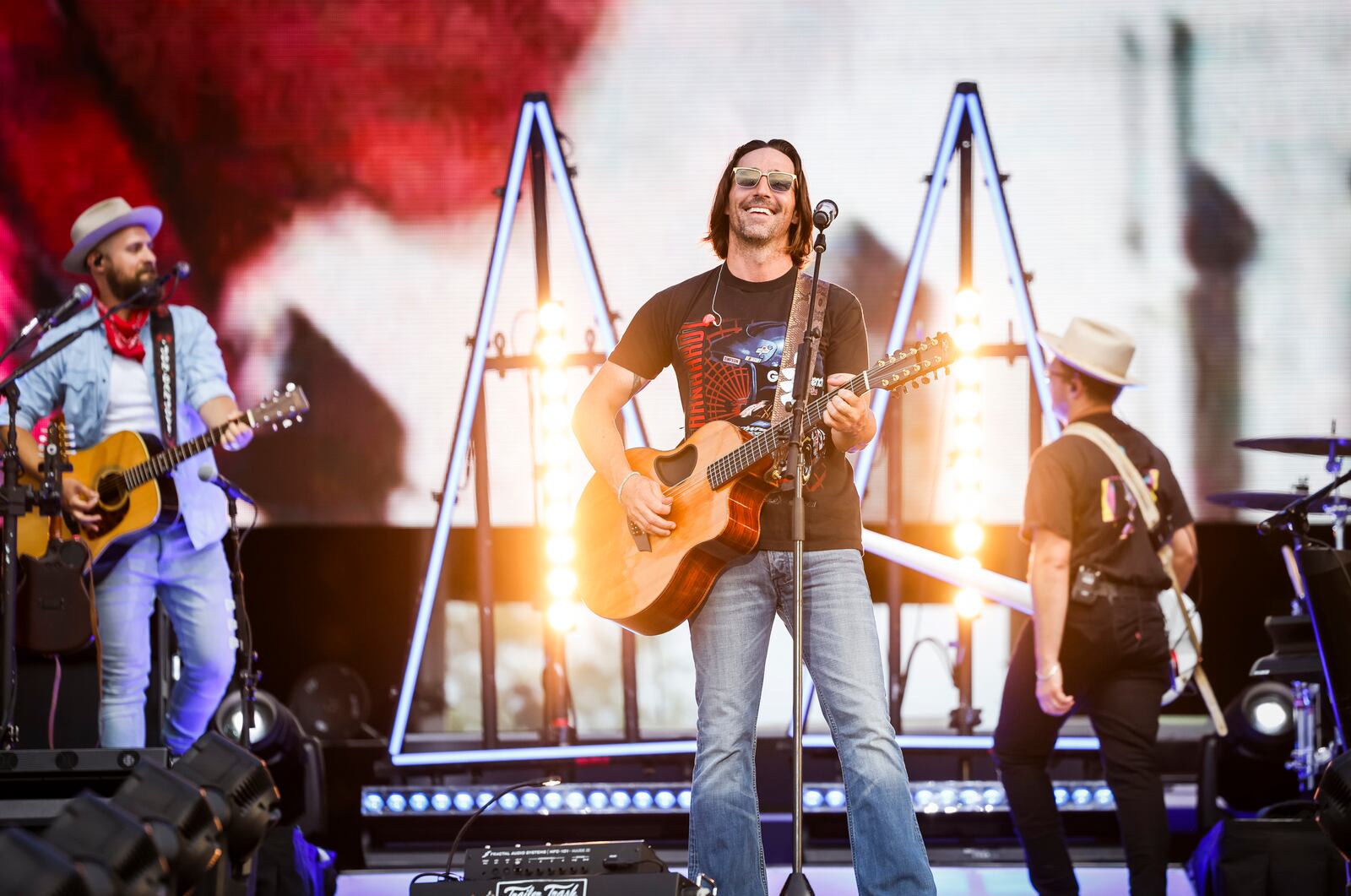 Jake Owen and his band performs on day four of the first Voices of America Country Music Fest Sunday, Aug. 13, 2023 on the grounds of National Voice of America Museum of Broadcasting in West Chester Township. NICK GRAHAM/STAFF